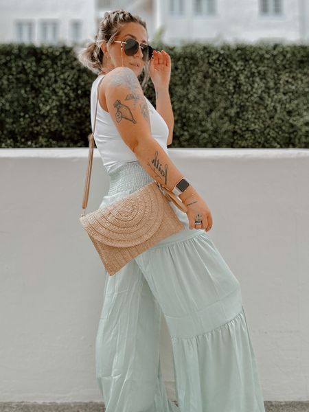 Cruise outfit / Miami outfit idea. Light green palazzo pants (small) with tank top (medium) paired with a crochet bag. Beachy boho vacation outfit idea. 

#LTKstyletip #LTKSeasonal #LTKFind