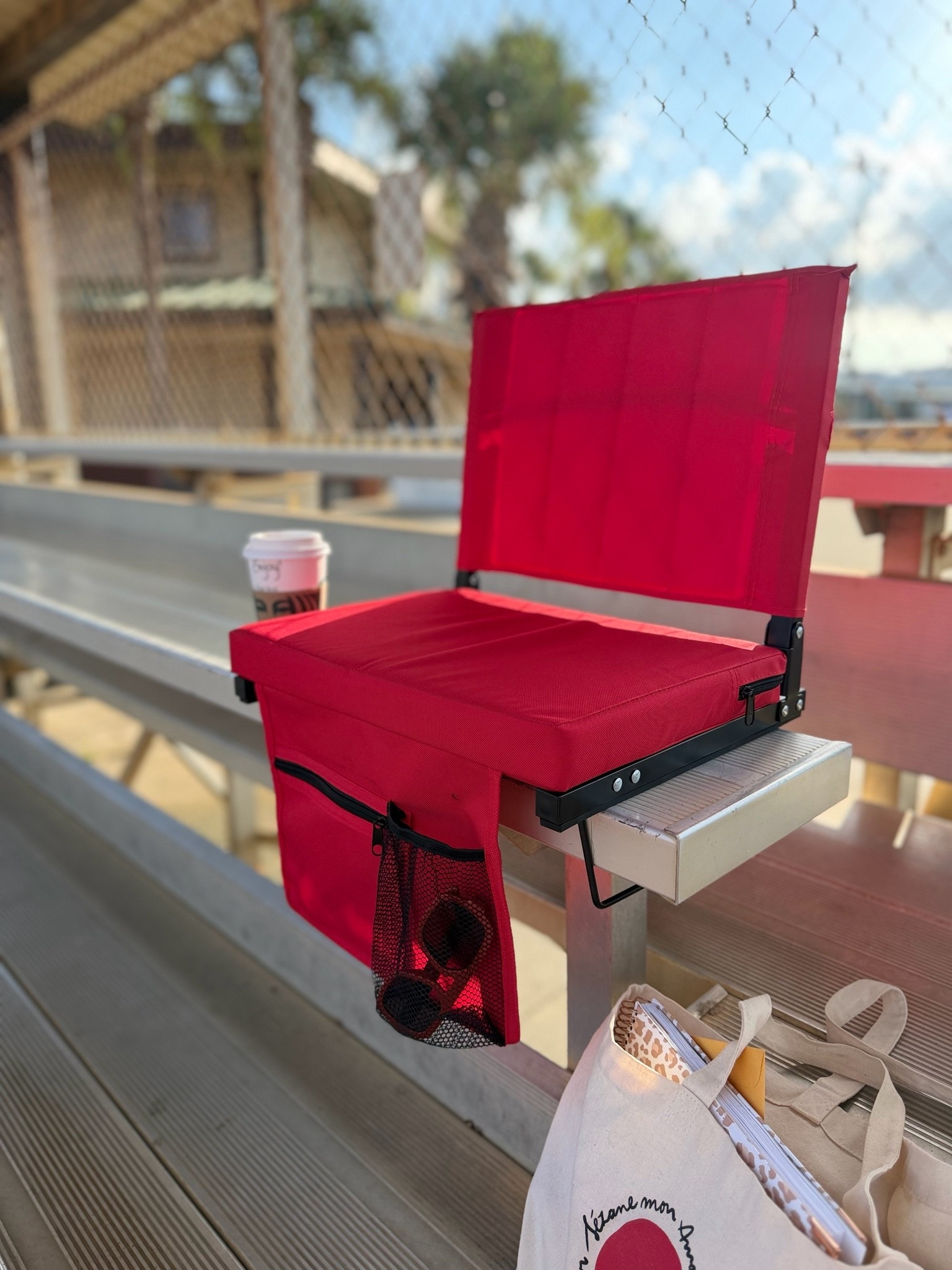 If your weekends look anything like mine, this stadium chair is a must-have. ⚾🥎🏈

After years of sitting on hard bleachers through softball tournaments, baseball games, and football season, I finally bought one then immediately wondered why I waited so long.

The thick padded seat makes all-day tournaments so much more comfortable, while the secure hooks keep it attached to the bench so it doesn’t slide around. I also love the built-in storage pockets for sunglasses, keys, phone, and all the little things parents seem to carry to every game.

It folds flat, stores easily, comes in multiple colors, and has earned a permanent spot in my game day gear. 

Perfect for softball moms, baseball parents, football season, travel sports families, stadium seating, bleacher comfort, tournament weekends, and outdoor sporting events.

#LTKmomlife #LTKKids #LTKOver40
