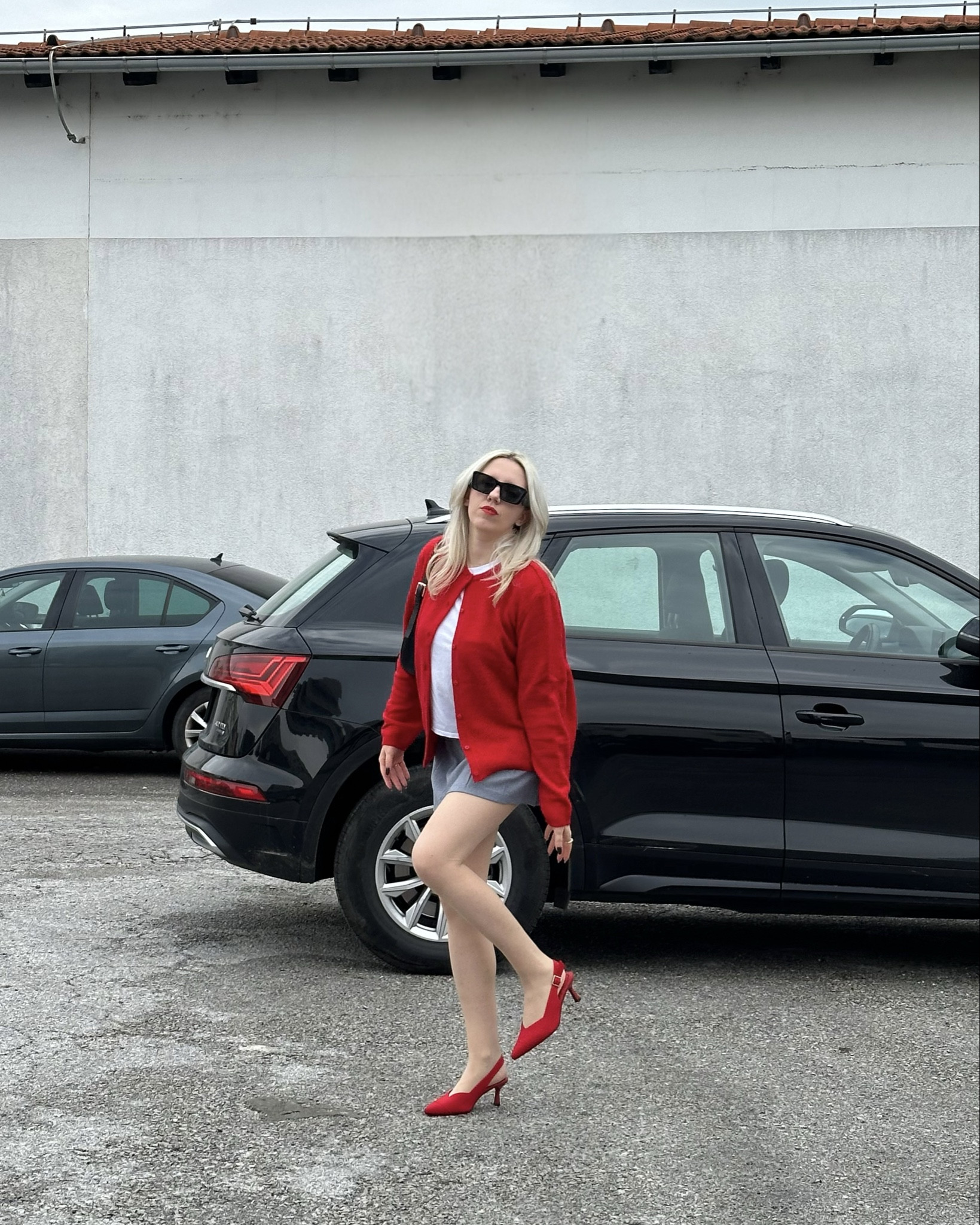 Red for Fall is a win! #redcardigan #greyskirt #redshoes #miniskirt #pradasunglasses

#LTKStyleTip #LTKHoliday