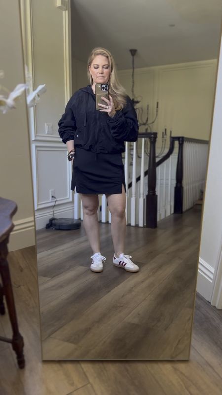 Easy, comfortable outfit to run errands for my son’s birthday.  I’m wearing a medium in everything.  I LIVE in the tank that I linked (wearing under the jacket).  The windbreaker is super lightweight and you can cinch the waistline.  The skort has pockets which is always a win in my book! 🙌🏽 They’re hard to see in the video but the earrings are so pretty (linked). The windbreaker and skort come in different colors. 

#LTKfindsunder50 #LTKover40 #LTKshoecrush