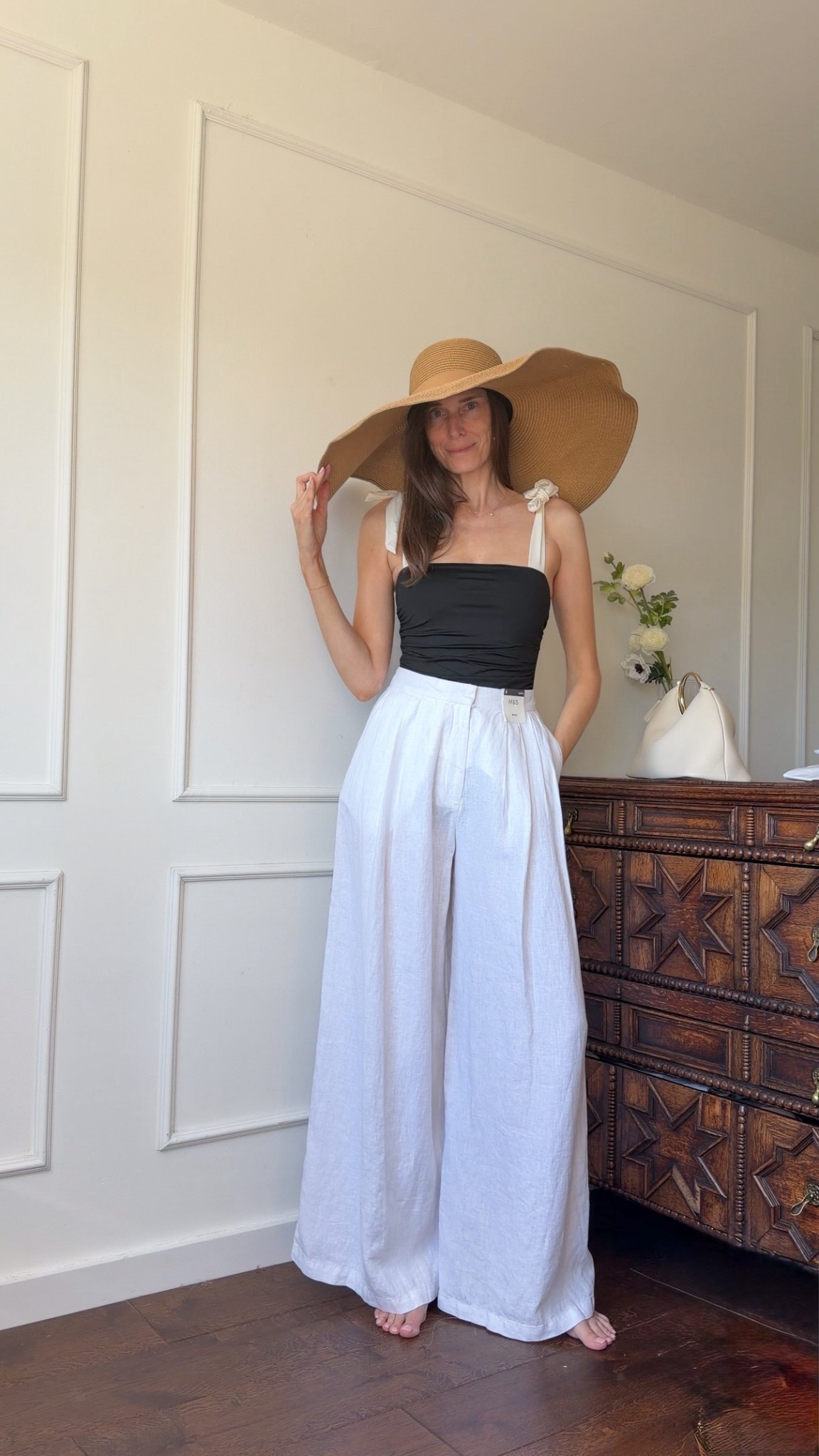 I’m wearing a small in the swimsuit and a UK 8 long in the trousers 

Wide brim straw hat, holiday outfits, linen trousers  

#LTKSwim #LTKootd #LTKOver40