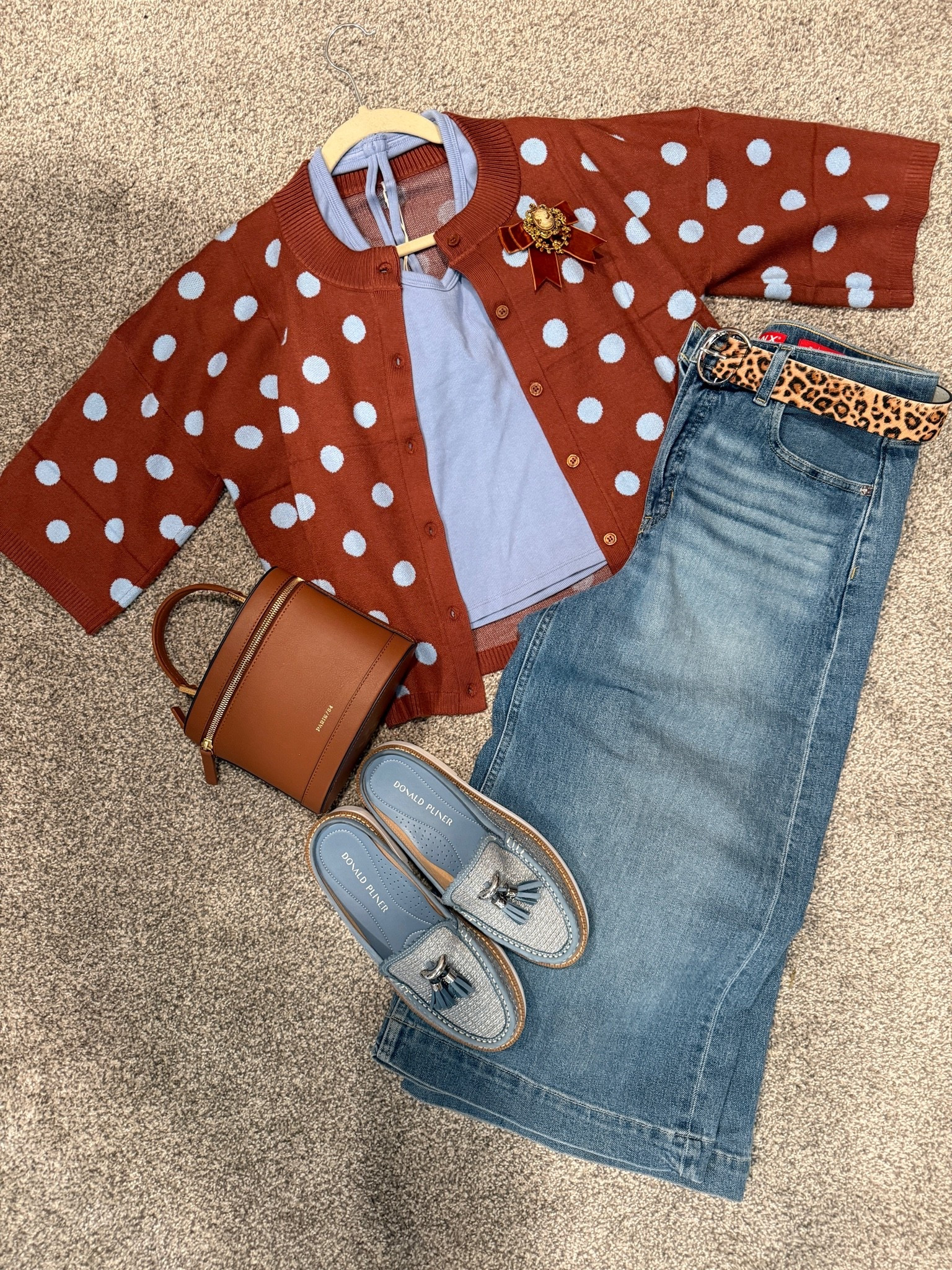 Fall transition outfit🍂🍁

Brown and blue color combo 🍂

The cutest brown and blue polka dot short sleeve cardigan
Fits tts wearing a med

Light blue built in bra tank top wearing a med tts 

On sale 🚨 Spanx wide leg crop jeans 

Donald Pilner light blue slide loafers! (So comfy and fit tts) 

Leather bag by Paris 1964

Leopard belt 

A sweet velvet bow with cameo pin

#LTKootd #LTKOver40 #LTKSaleAlert