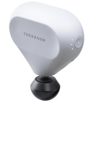 THERABODY THERAGUN Mini Percussive Therapy Massager in White from Revolve.com | Revolve Clothing (Global)