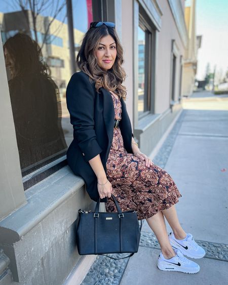 Sharing an easy look for fall workwear.
I’ve paired this paisley slip dress with a black belt, oversized black blazer. I’ve swapped out my dress shoes for these Nike air sneakers as I commute. I take my Michael Kors
Tote bag to work. 

Teacher outfit 
Workwear
Business casual 
Fall business casual
Midsize workwear
Size 10

#LTKSeasonal #LTKworkwear #LTKmidsize