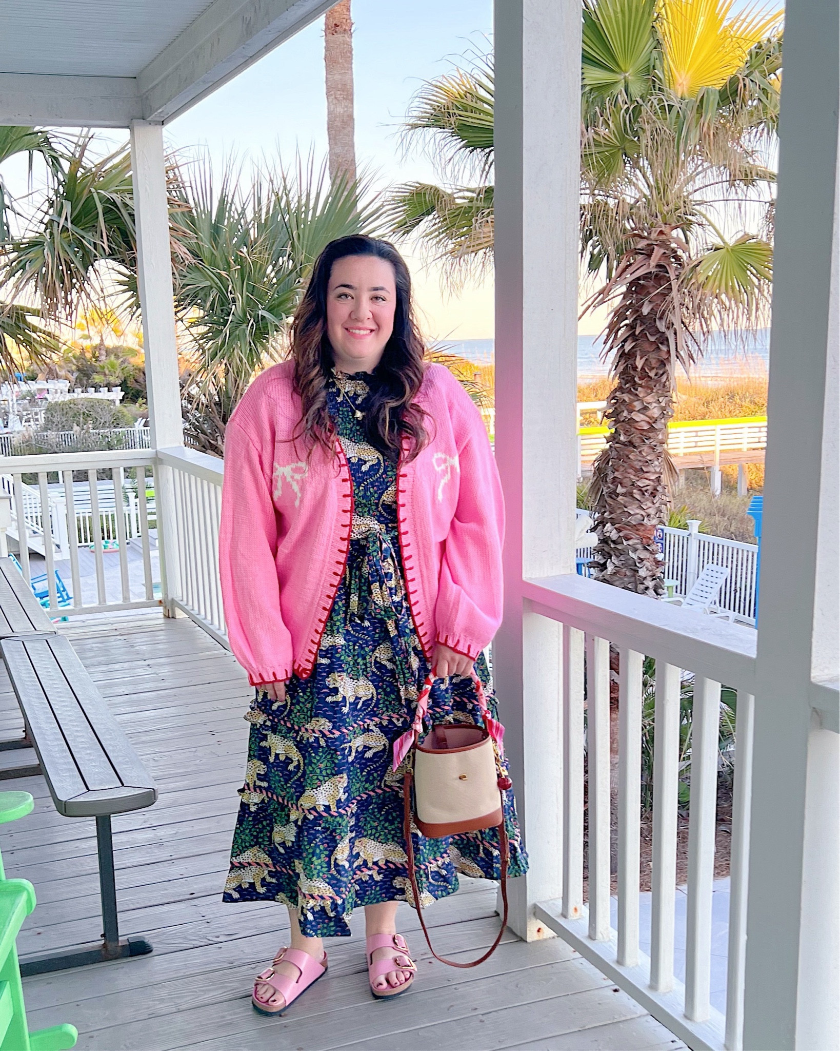 Pink bow cardigan and navy midi dress with leopard print 🎀 🐆 

#LTKSeasonal #LTKFindsUnder100 #LTKMidsize