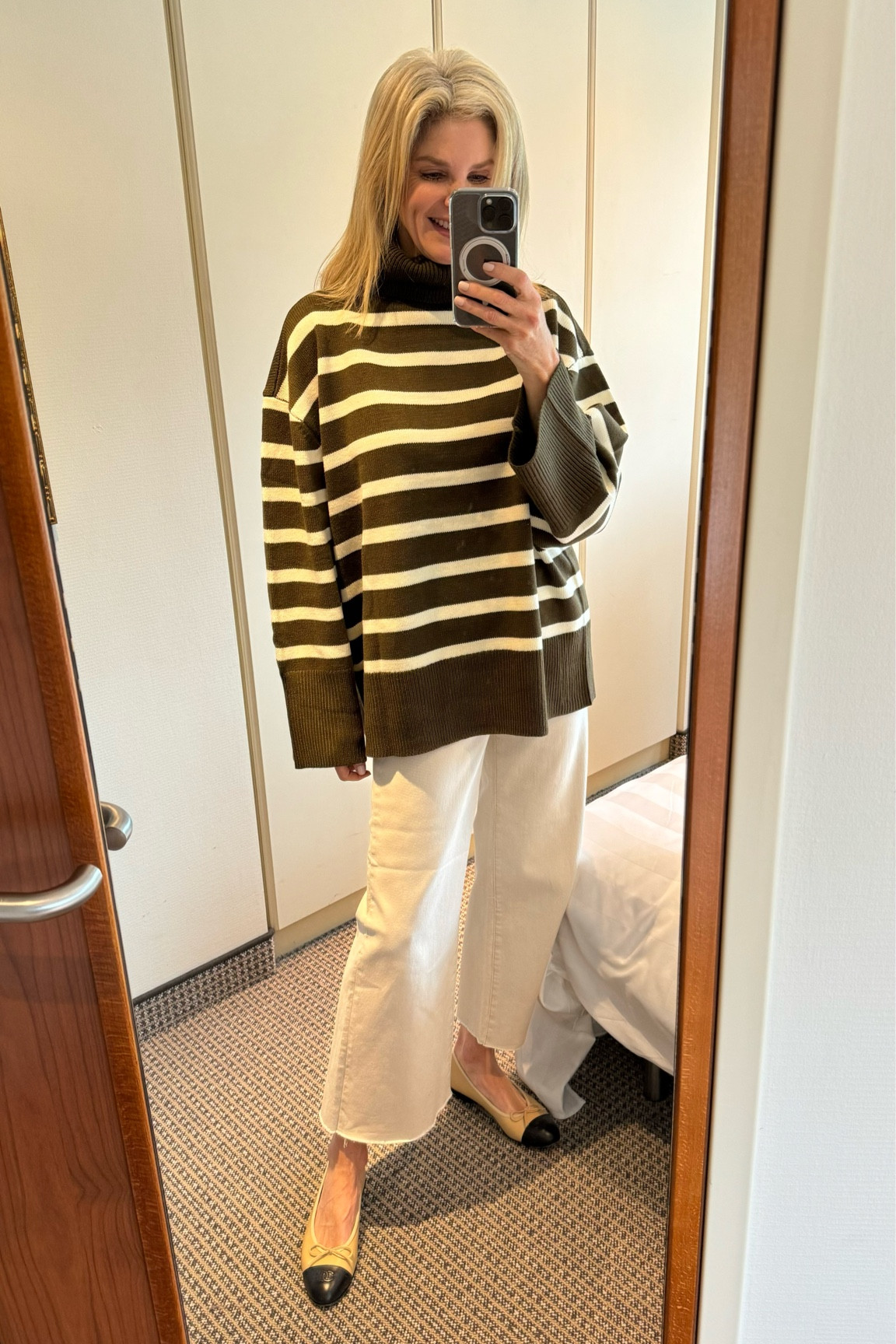 Oversized turtleneck and raw hem ivory jeans. Size down on sweater! 
Sweater - S/M
Jeans - 4
Sneakers - TTS 

#LTKover40 #LTKstyletip #LTKfindsunder100