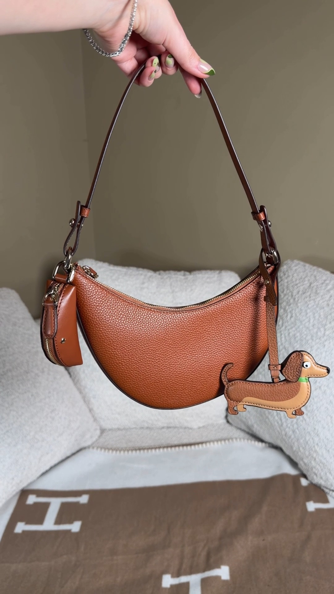 The viral Kate Spade mini duo bag that Kendall Jenner was spotted with at Coachella is finally back in stock!

After seeing the Kate Spade mini duo ba Kendall Jenner carried at Coachella (complete with the cutest dog charm) I knew I wanted one in my collection 😍 I’m not a suede girly so I got one that was more my style and I love the brown with the gold hardware.

The cute little pocket is so fun but it is also detachable so you can just wear the crescent shaped body which looks a bit more sleek and dressed up for going out. Such a versatile little purse.

I already buy too much Coach and Longchamp and Coach outlet bags, I do not need to add another brand to the mix 😅 or do I ?

Kate spade duo mini bag, Kate spade outlet

#LTKootd #LTKmorningroutine #LTKgrwm
