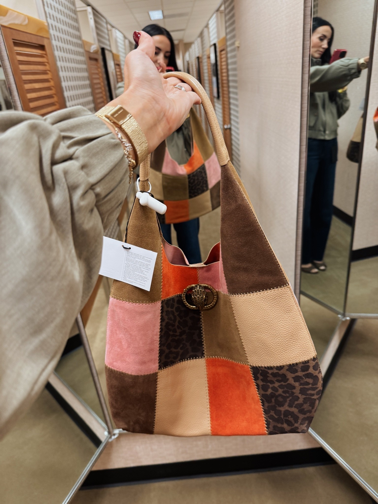 This purse reminded me of Coach- but is also a designer bag. Love the colors and the shape. On sale now- this one will get compliments
