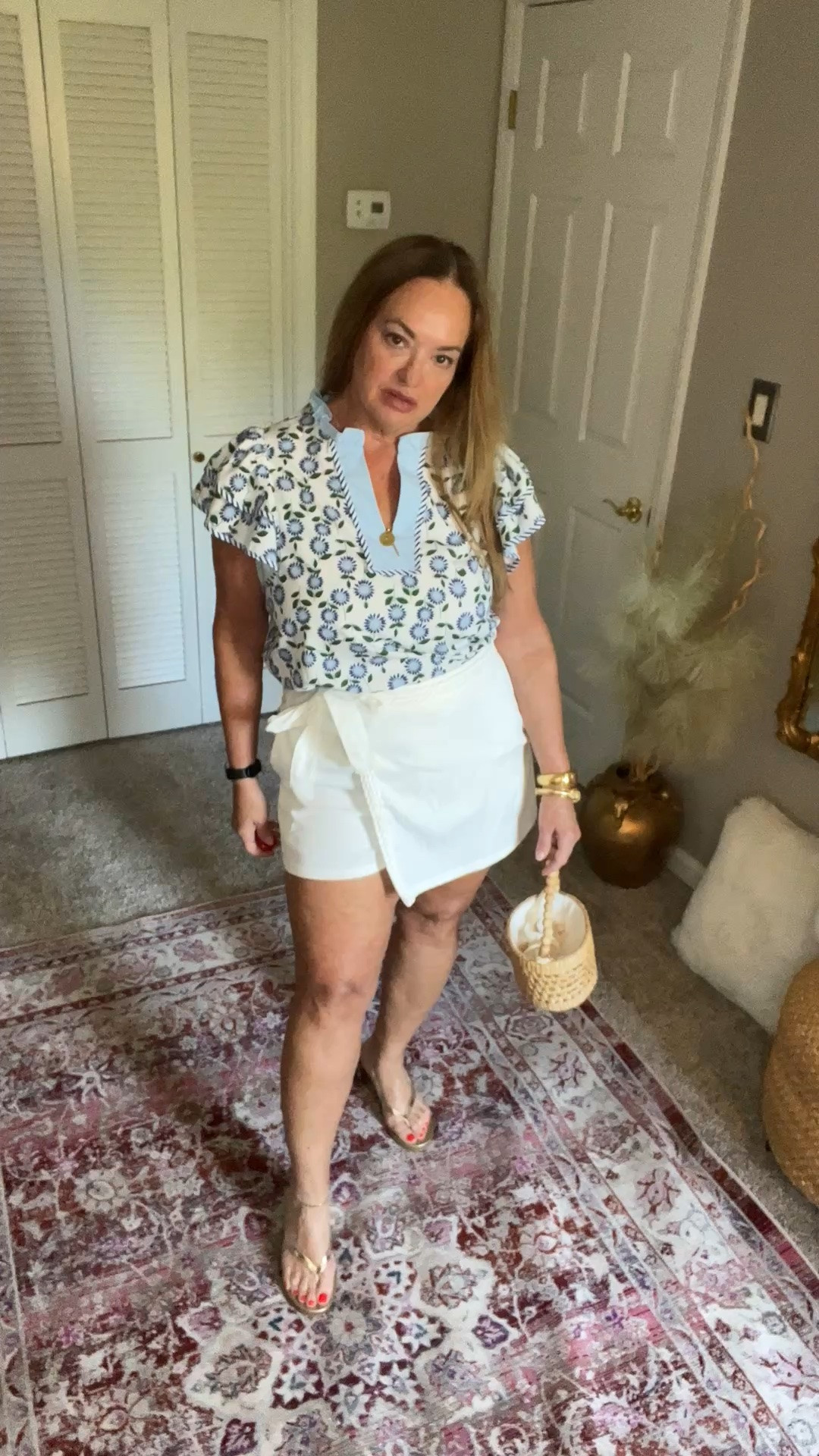 Faux wrap skort with braided details. It also has pockets. This mixed media floral top is so beautiful and giving palm beach vibes.

#LTKdayinmylife #LTKSeasonal #LTKOver40