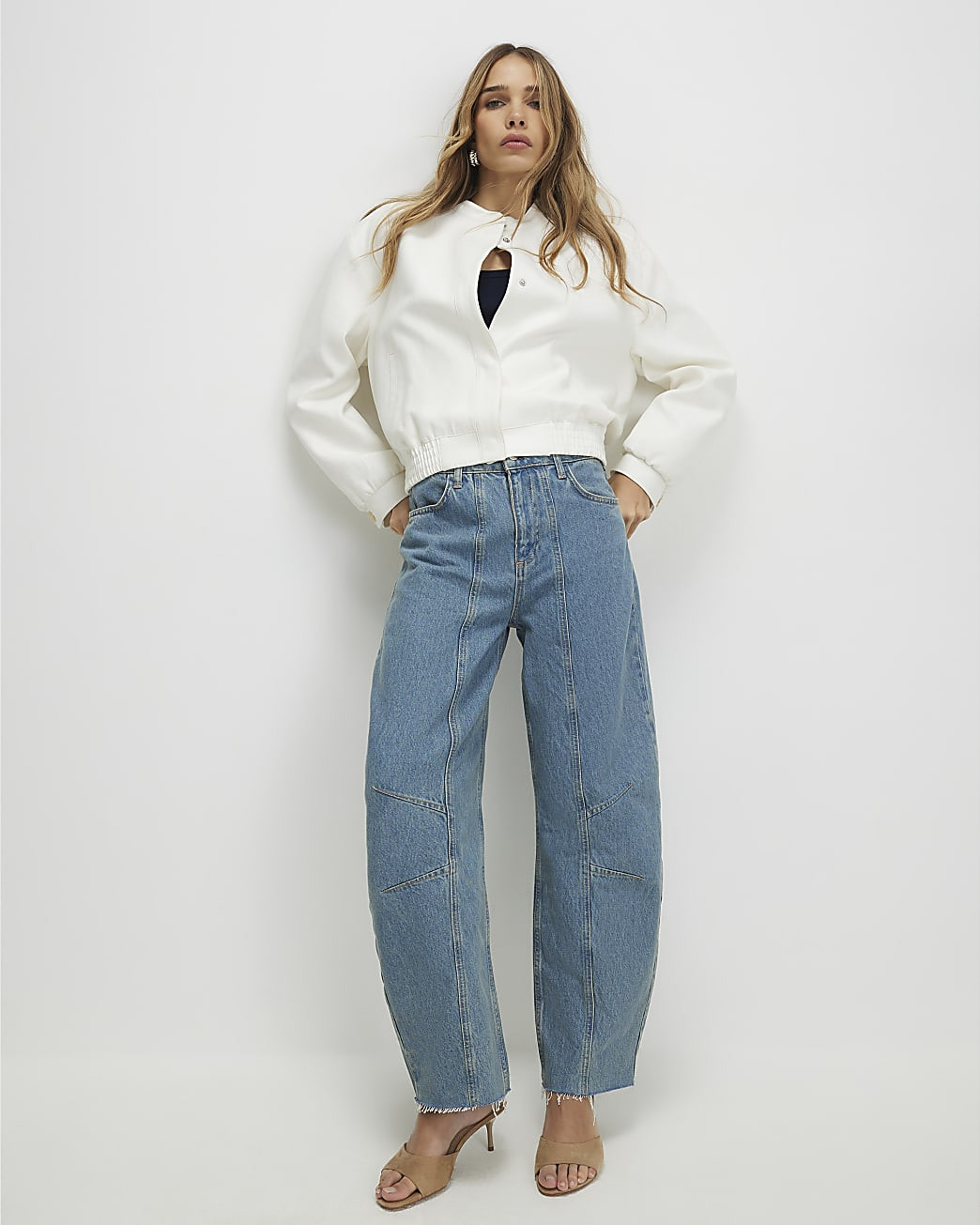 Blue Seamed Raw Hem Barrel Leg Jeans | River Island UK & IE