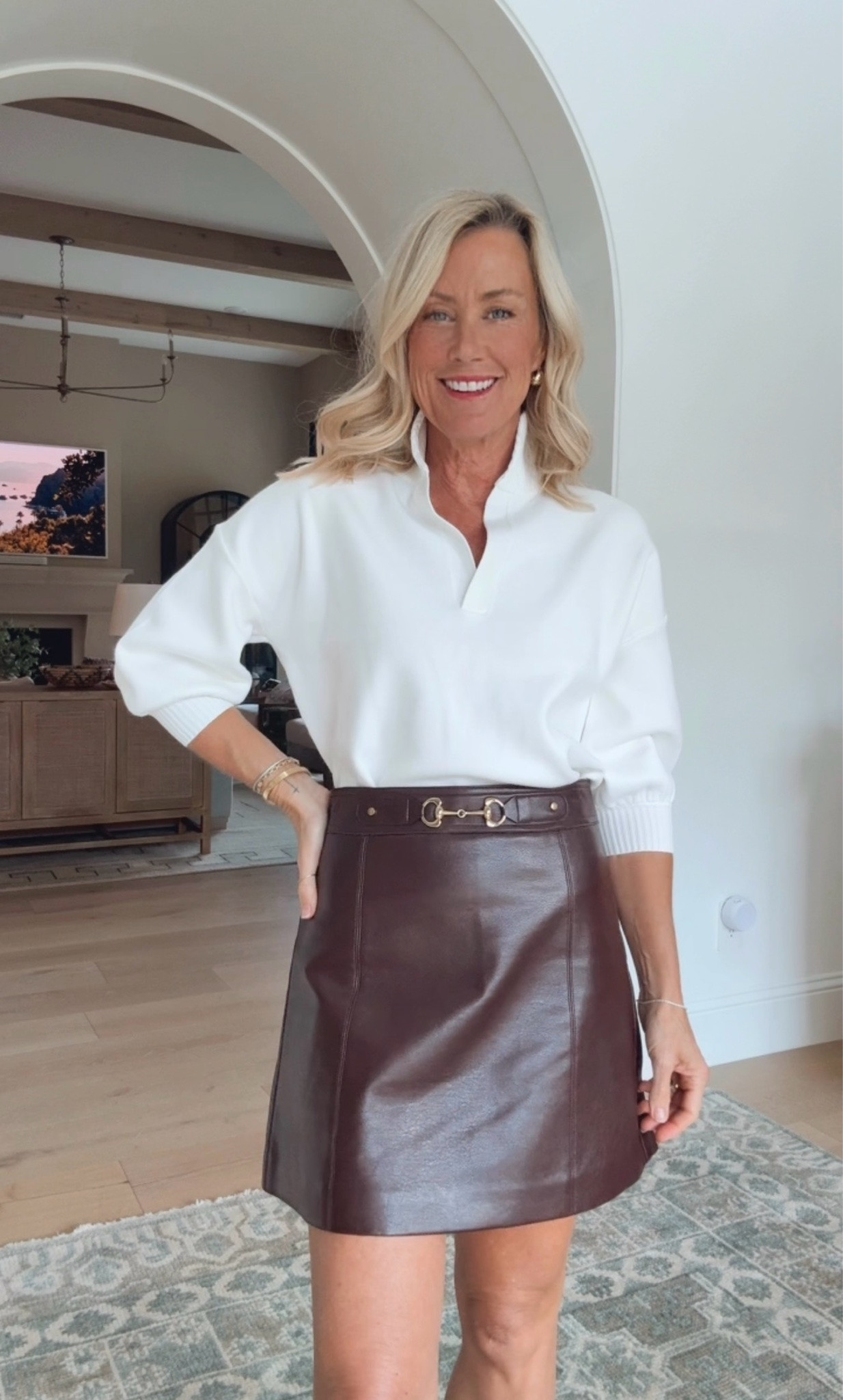 Absolutely adore this whole fit! Loving the faux leather skirt and sweater combo.

#LTKootd #LTKOver40 #LTKSeasonal