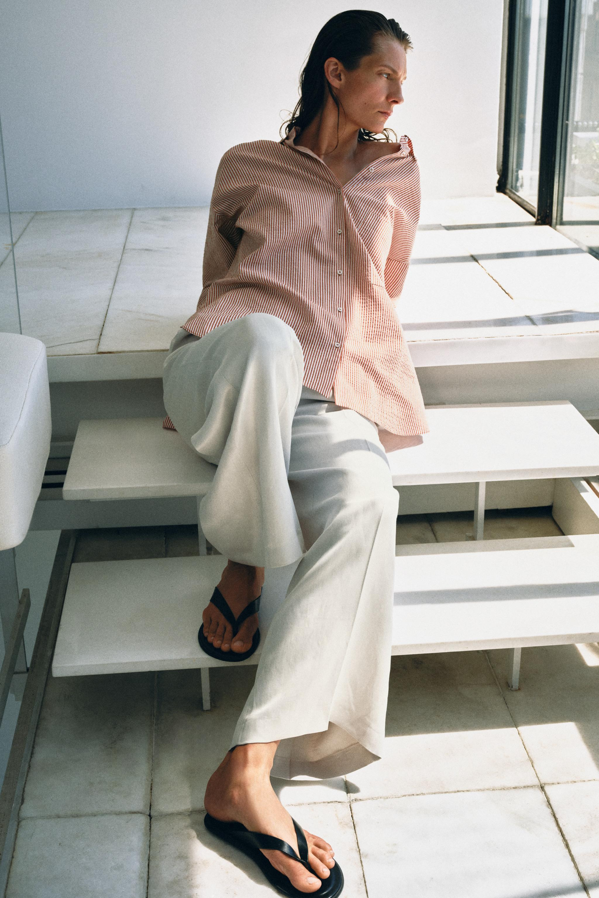 Model height: 181 cmZARA WOMAN COLLECTION. Shirt with a regular collar and long sleeves. Featurin... | Zara UK