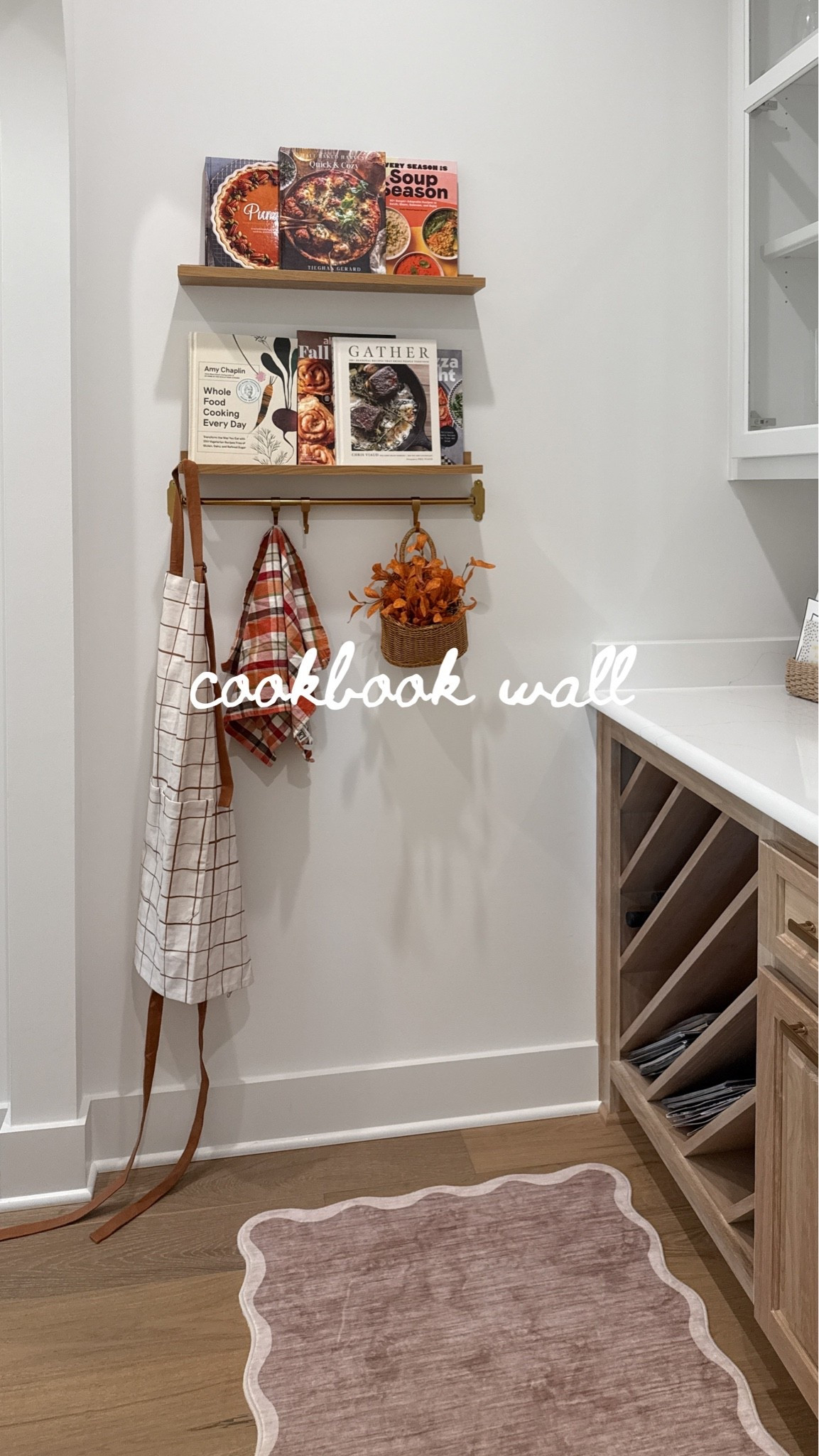 My fall cookbook wall is complete! I love this little corner of my kitchen, it’s so fun to change up every season! Shelves and gold hanging rod are Amazon!

Home decor, fall decor, cozy