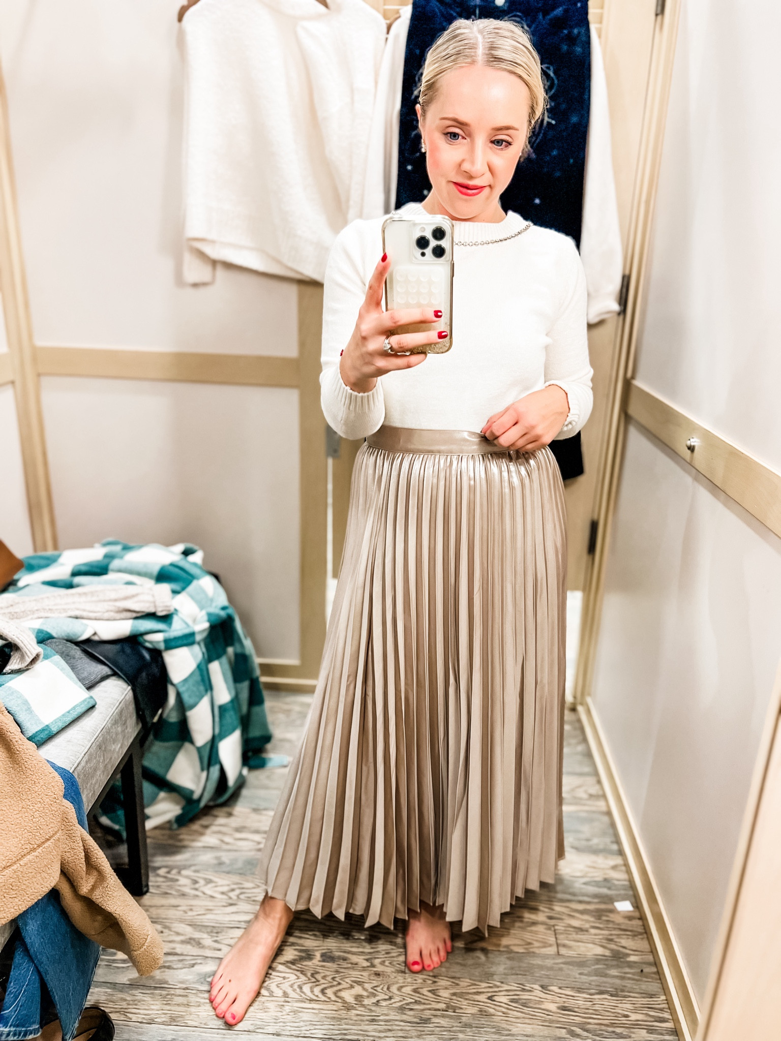This gold pleated skirt fits tts! It was long in non petite sizes in store, but comes in petite lengths. Sweater is reversible and can be worn with the bow on the front or the back. Petite sized small and fits tts. 50% off for cyber week! 
Holiday outfit, Christmas outfit, pleated skirt, gold skirt, foil skirt, petite skirt, holiday sweater, reversible sweater, loft 

#LTKSaleAlert #LTKCyberWeek #LTKHoliday