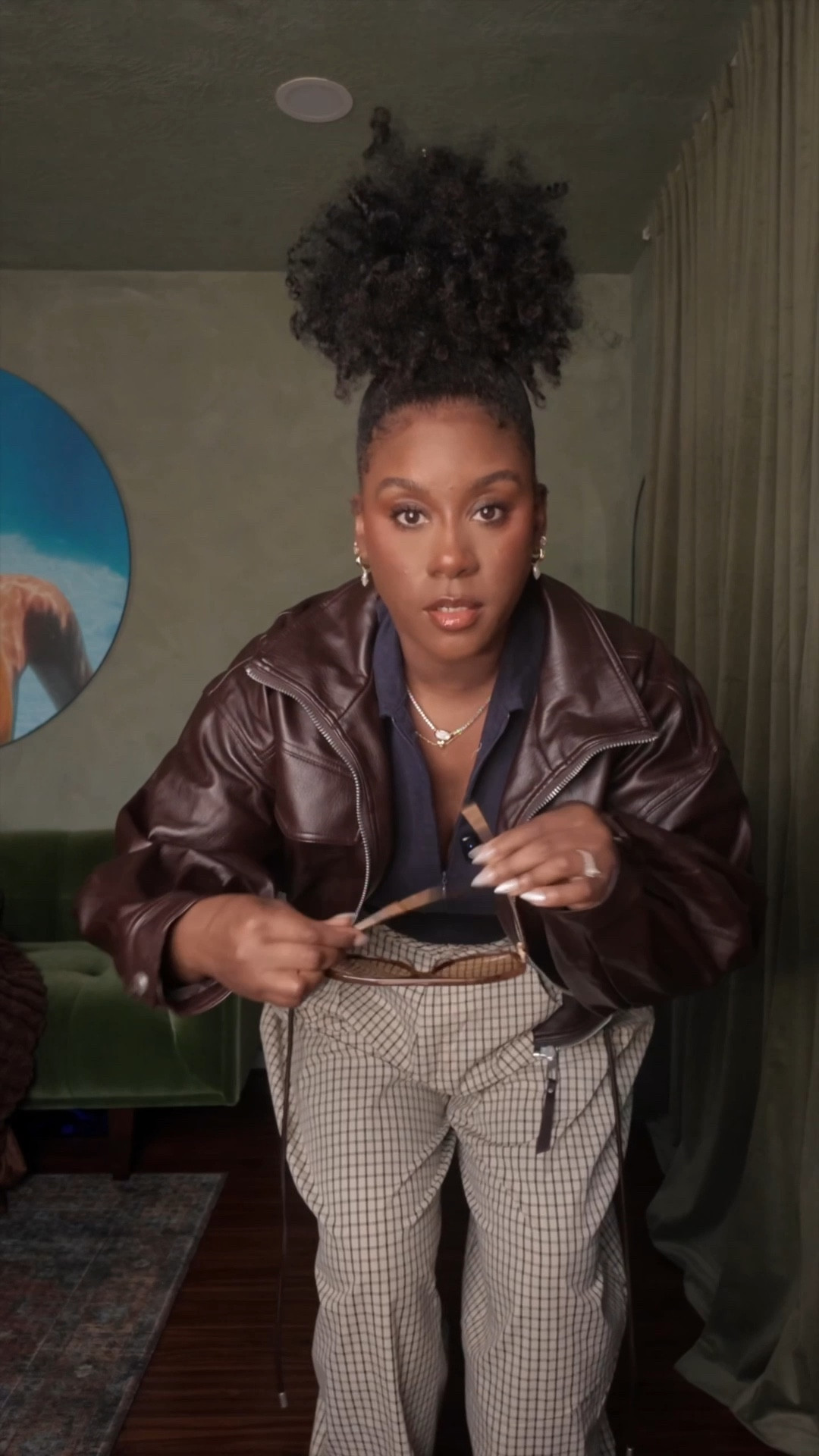 Balloon checkered pants, blue body suit, platform loafers and faux leather jacket. Kendra Scott jewelry 