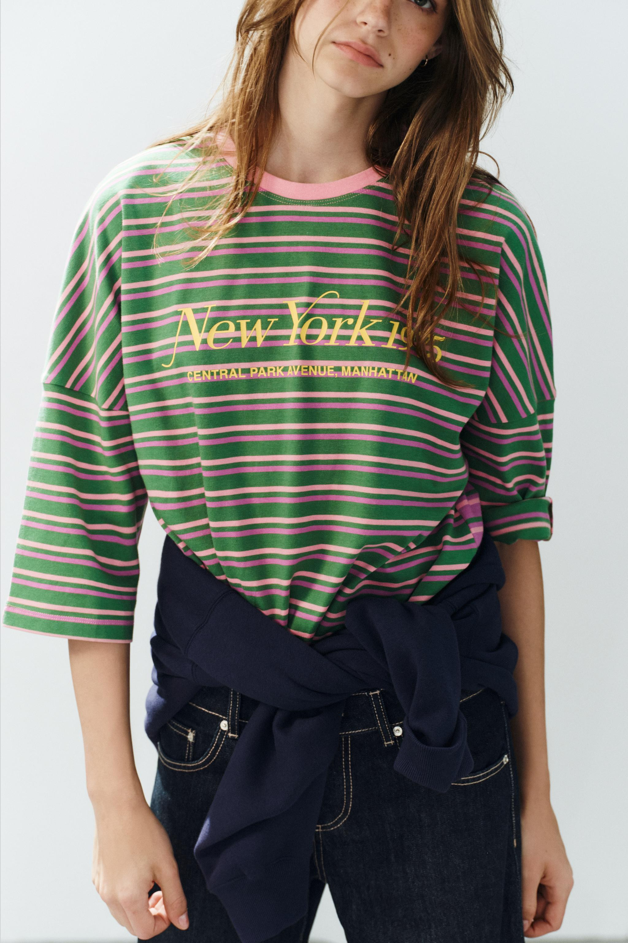 Model height: 179 cmOVERSIZE FIT - ROUND NECK - THREE-QUARTER SLEEVES. T-shirt made from 100% cot... | Zara UK