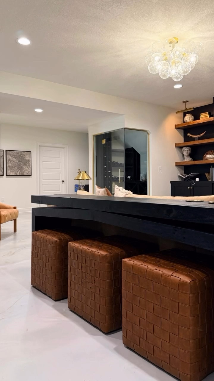 The Target stools I shared on stories when I ordered didn’t disappoint!! Love the way they mimic the color of the wooden shelves in our builtins. The look of the faux leather up close is 🤌🏾. Such a great addition to our basement, just in time for hosting! 🖤