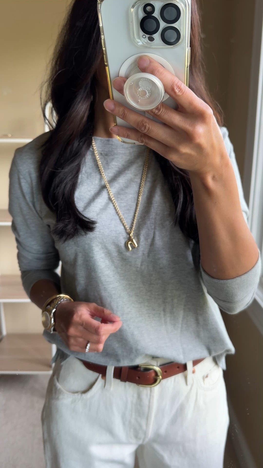 Elevated long sleeve t-shirt outfit idea for Fall. 
Pair with off-white denim, add a belt. 
Add suede accessories in rich brown tones. 
Finish with simple gold jewelry and oversized denim jacket. 
- This exact long sleeve t-shirt is all cotton and soft, with a lived-in feel. True to size for me. Currently on sale for $24. 
- Exact jeans in ecru are my current favorite Levi’s style. 
- Leather belt is a closet staple. I also have this one in black. On sale for $46  
- Chic suede flats are comfy out of the box. True to size. 
- Suede shoulder bag in a trending silhouette. This is my favorite non-designer option for the look and quality. 
- Oversized denim jacket comes in multiple washes and roomy enough to layer over sweatshirts and sweaters. 
- Versatile gold tone jewelry that matches everything. 


#LTKStyleTip #LTKOver40 #LTKFindsUnder50