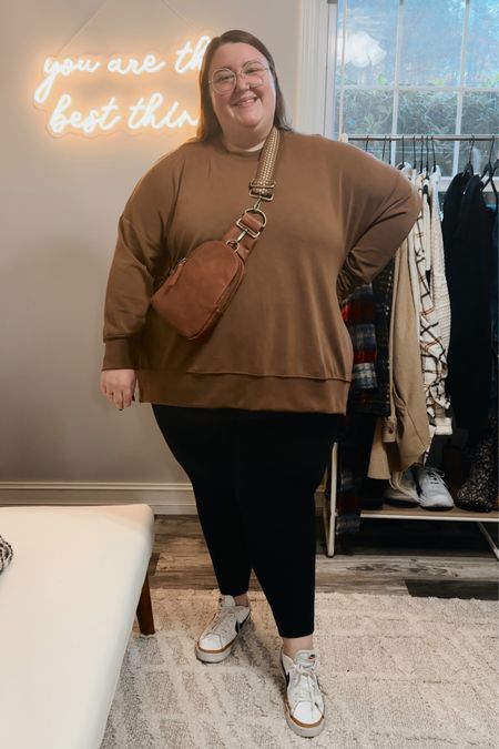 Plus size outfits I wore on a family girls trip to Highlands, NC! Travel outfit! Paired Torrid signature pocket leggings (sized up to a 5 in these for added comfort), my Arula Dreamluxe sweatshirt (size C), Nike sneakers, Warby Parker glasses and Anthropologie sling bag

#LTKstyletip #LTKcurves #LTKSeasonal