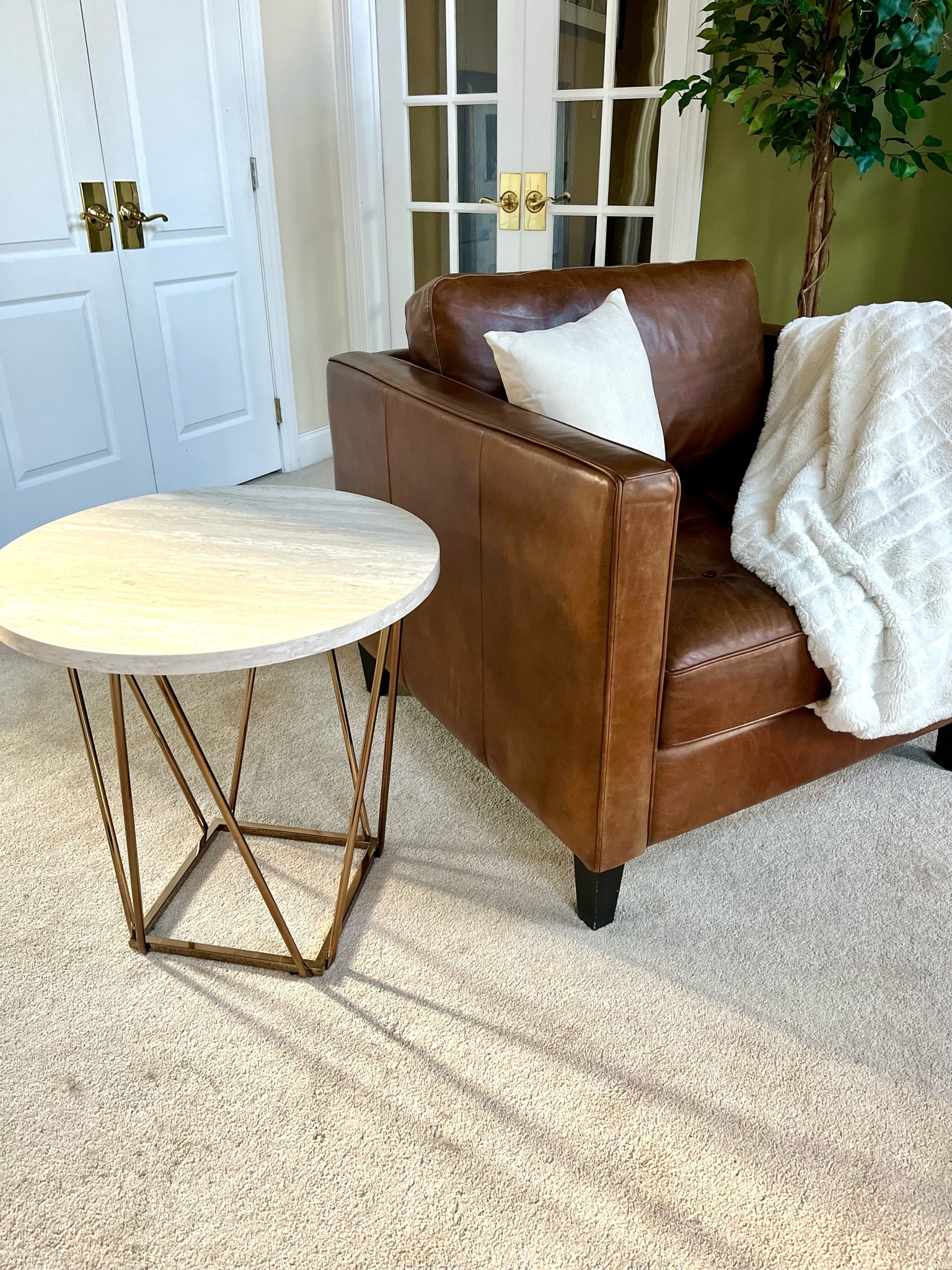 Another little cozy nook in my house 😍 

Leather chair, brown leather chair, coffee table, reading nook, neutral decor, living room 



#LTKfamily #LTKhome #LTKsalealert
