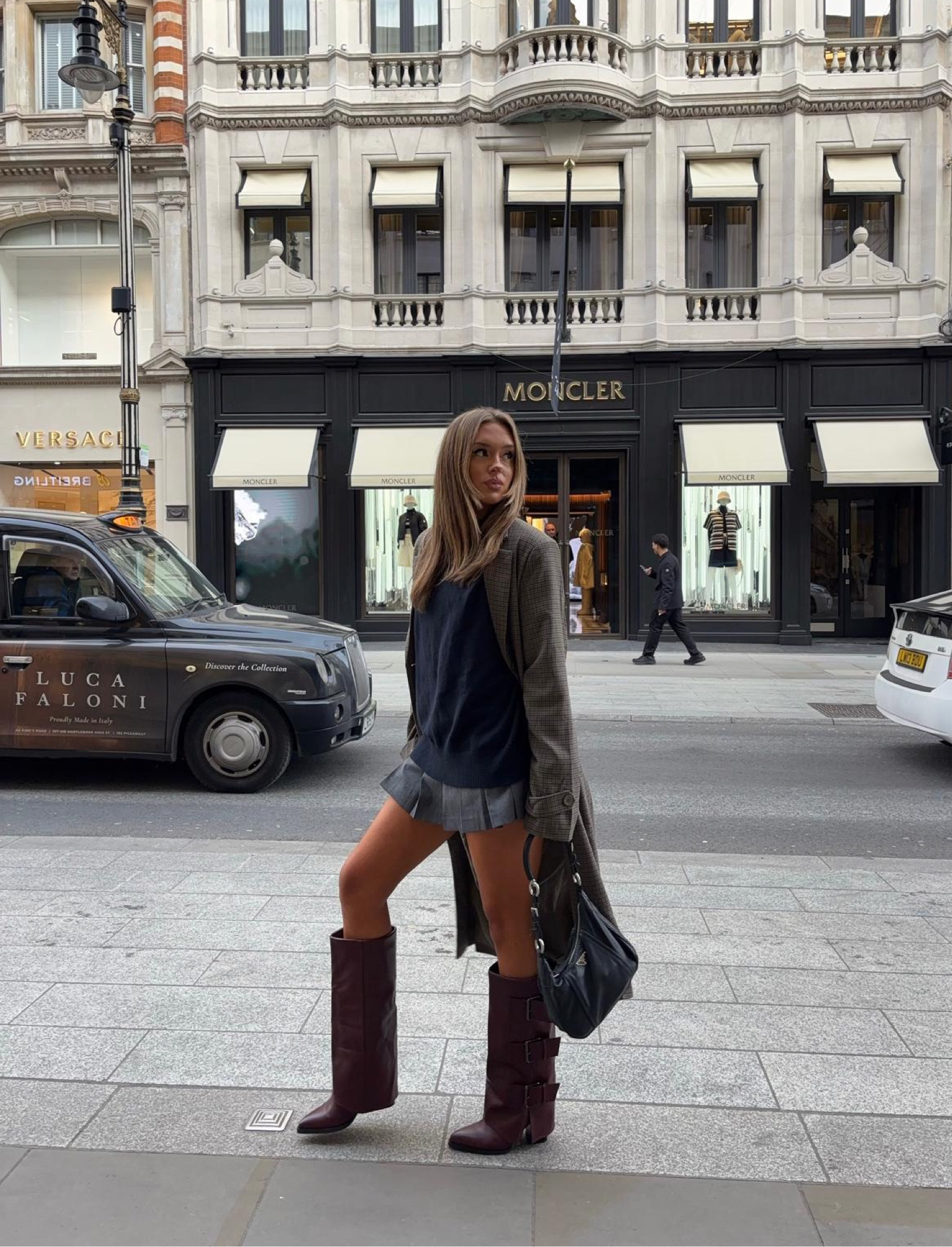 Navy chunky knit jumper, check trench coat, grey pleated mini skirt, burgundy gold over buckle biker boots, vintage Prada leather handbag 

#LTKuk #LTKFashionMonth #LTKspring