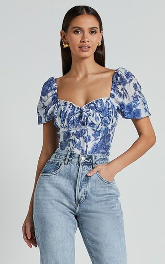 Liana Top - Short Sleeve Bustier Top in White and Blue Floral | Showpo (US, UK & Europe)