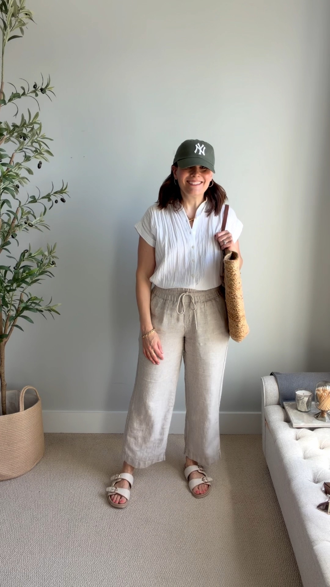 I’m wearing a white dolman-sleeve blouse with a collar, which instantly makes the outfit feel more put-together. This LOFT dolman shirt has a gauze material that’s so light and comfy. Wear it tucked in or out. These are the @onequince khaki wide leg linen pants. They fit true to size. I’m a medium and the 28 inch inseam. ￼

#LTKSaleAlert #LTKOver40 #LTKMidsize