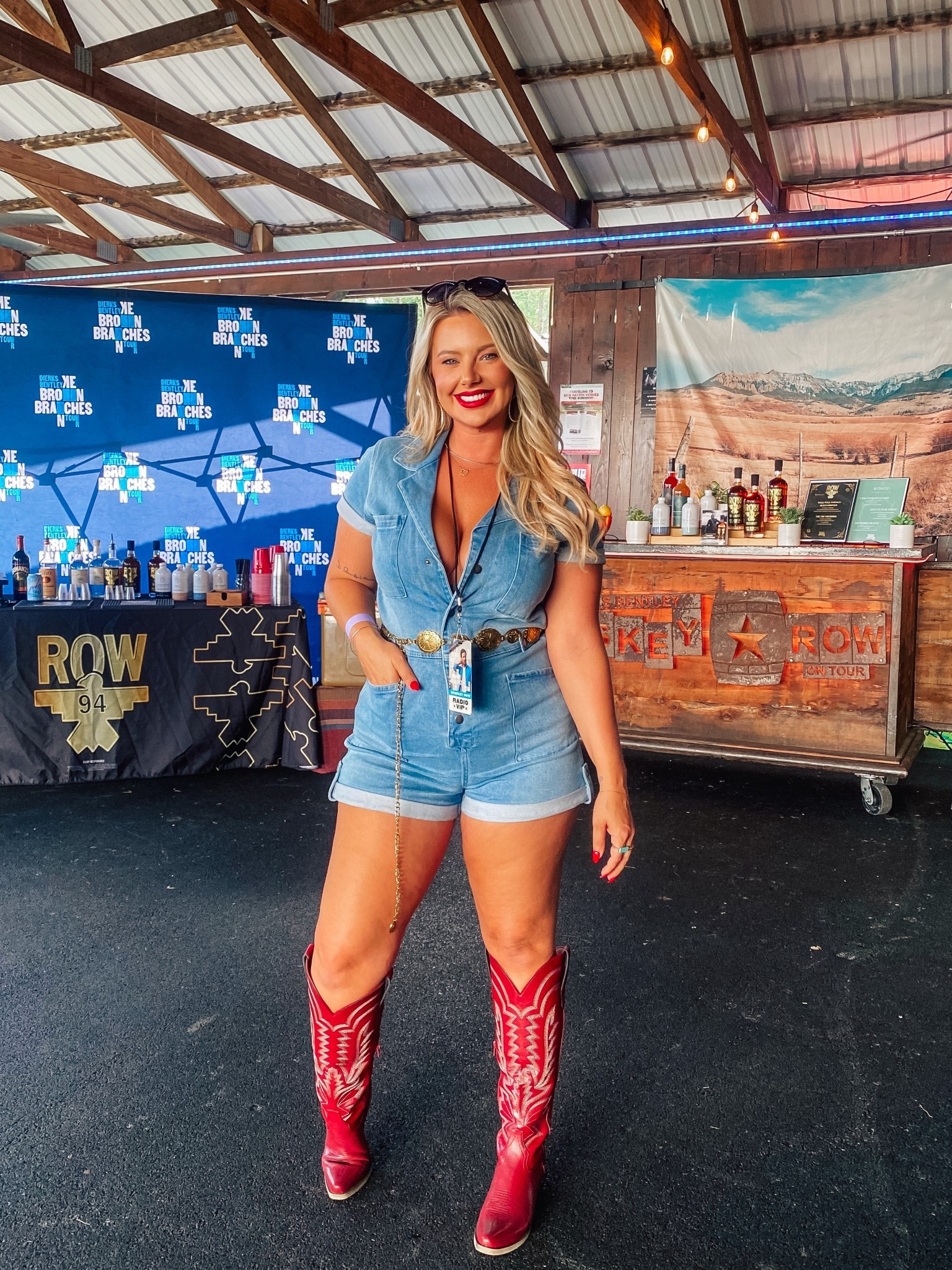 Cutest jean jumpsuit, perfect for country concerts! Love my new red cowboy boots too. Country belt is from Amazon. 

#LTKSeasonal #LTKFindsUnder50 #LTKShoeCrush