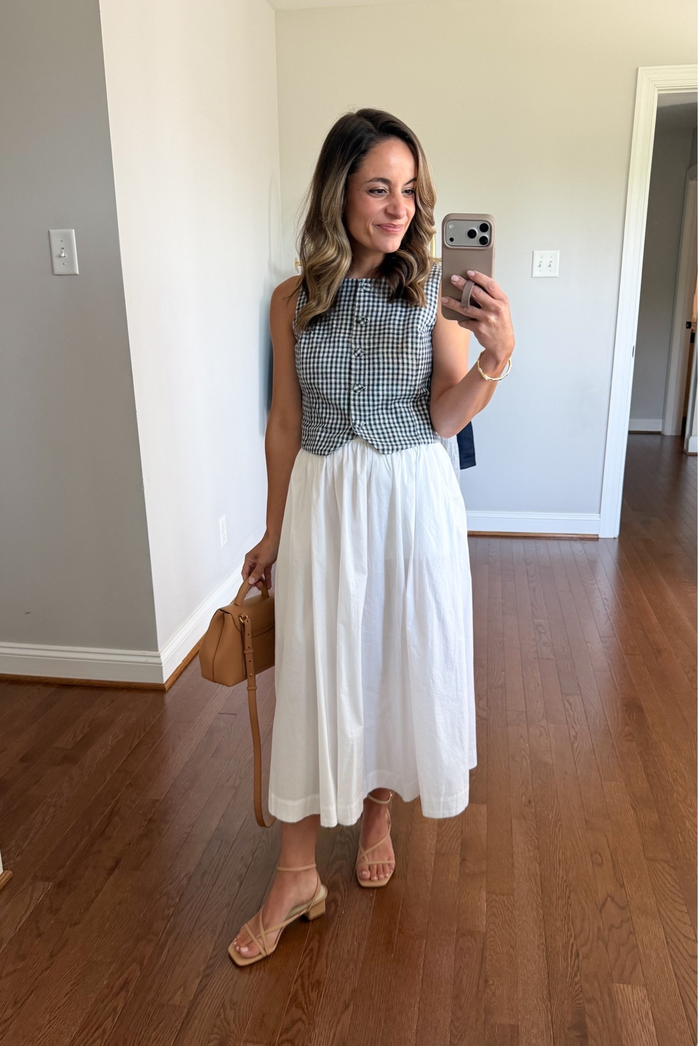 Four ways to style a cotton poplin midi skirt - petite friendly! 

Skirt (J.Crew Factory): xxs - I chose standard over petite for a little more length. It’s true to size and unlined. I add a slip with mine. 

Vest (Kohl’s): xs 
Shoes (Dolce Vita): true to size, snug across toes 
Bag (Polene)

#LTKPetite