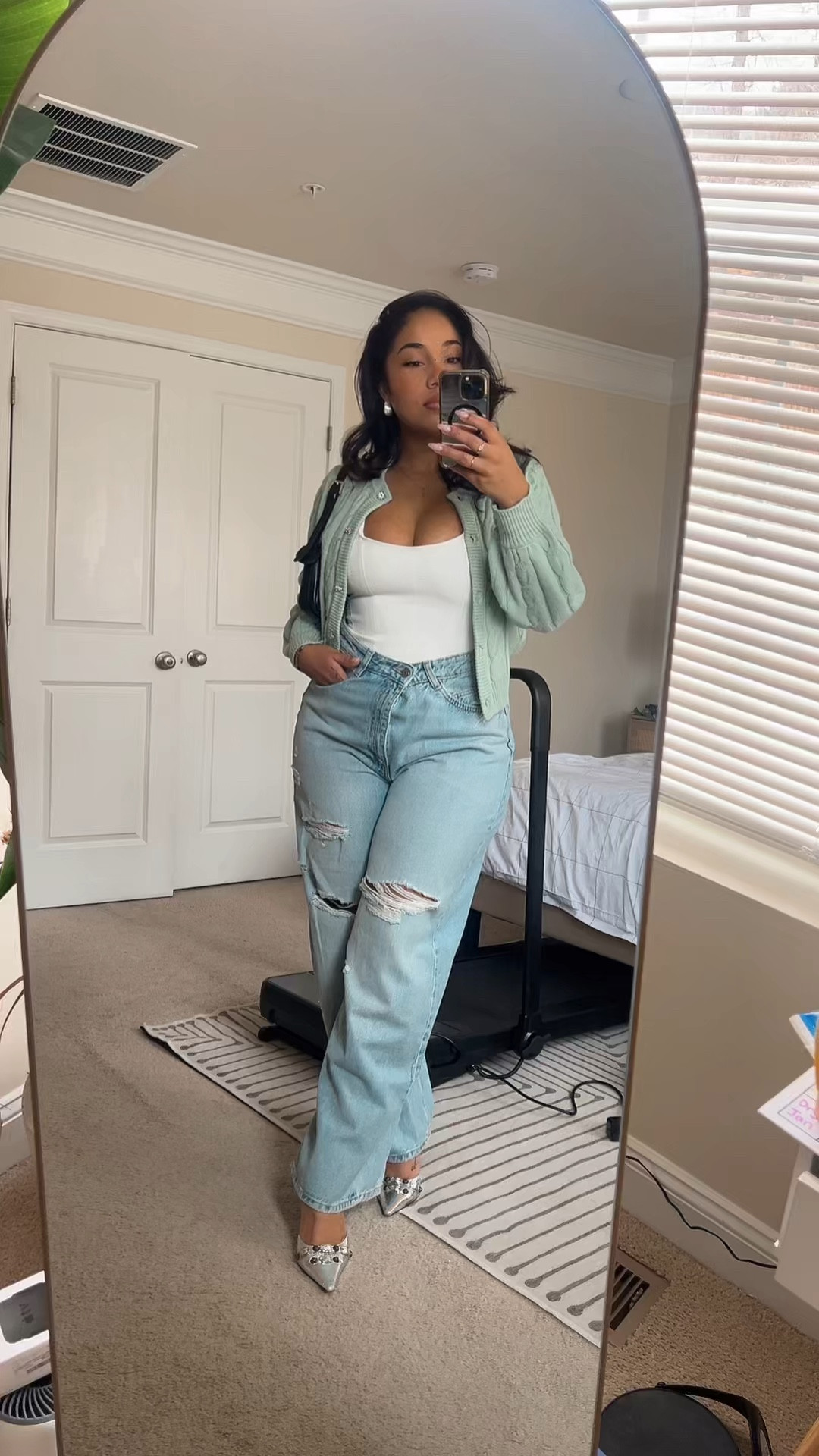 Spring is definitely in the air and I’m taking full advantage of it! I couldn’t wait to get into these ripped baggy jeans from Zara and a fitted white halter will always be my go to for elevating an outfit 🙌🏽 This mint green cardigan is years old but I found some other options that are just as cute! And y’all already know I’m a Steve Madden girlie so 95% of the time, that’s who’s on my feet 😊 

#LTKSeasonal #LTKStyleTip #LTKFindsUnder100