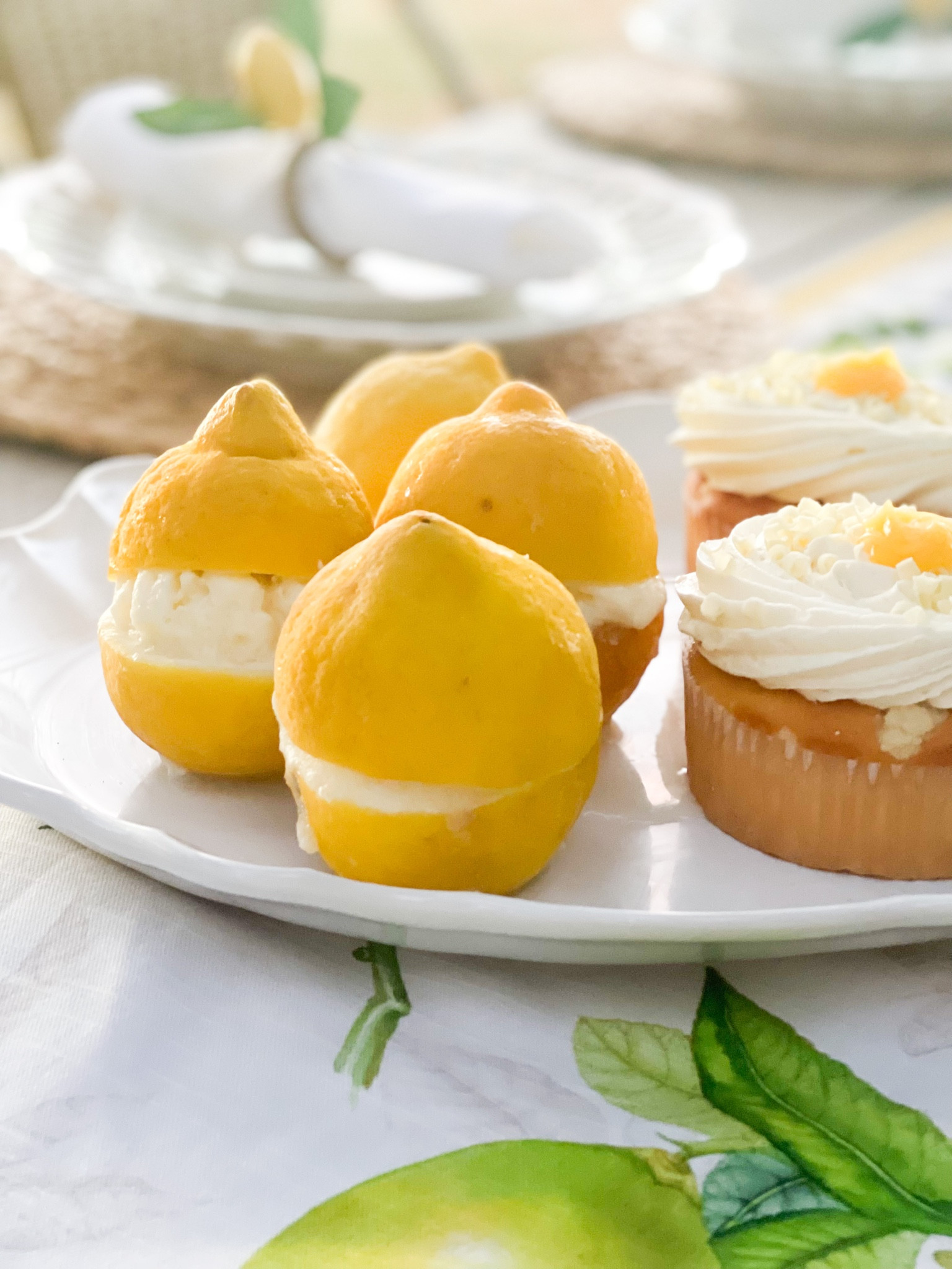 Homemade Lemon sorbet in lemon shells. White serving platter. Lemon tablescape. Italian summer theme table decor. 💛🤍🍋 

#LTKunder50 #LTKhome #LTKFind