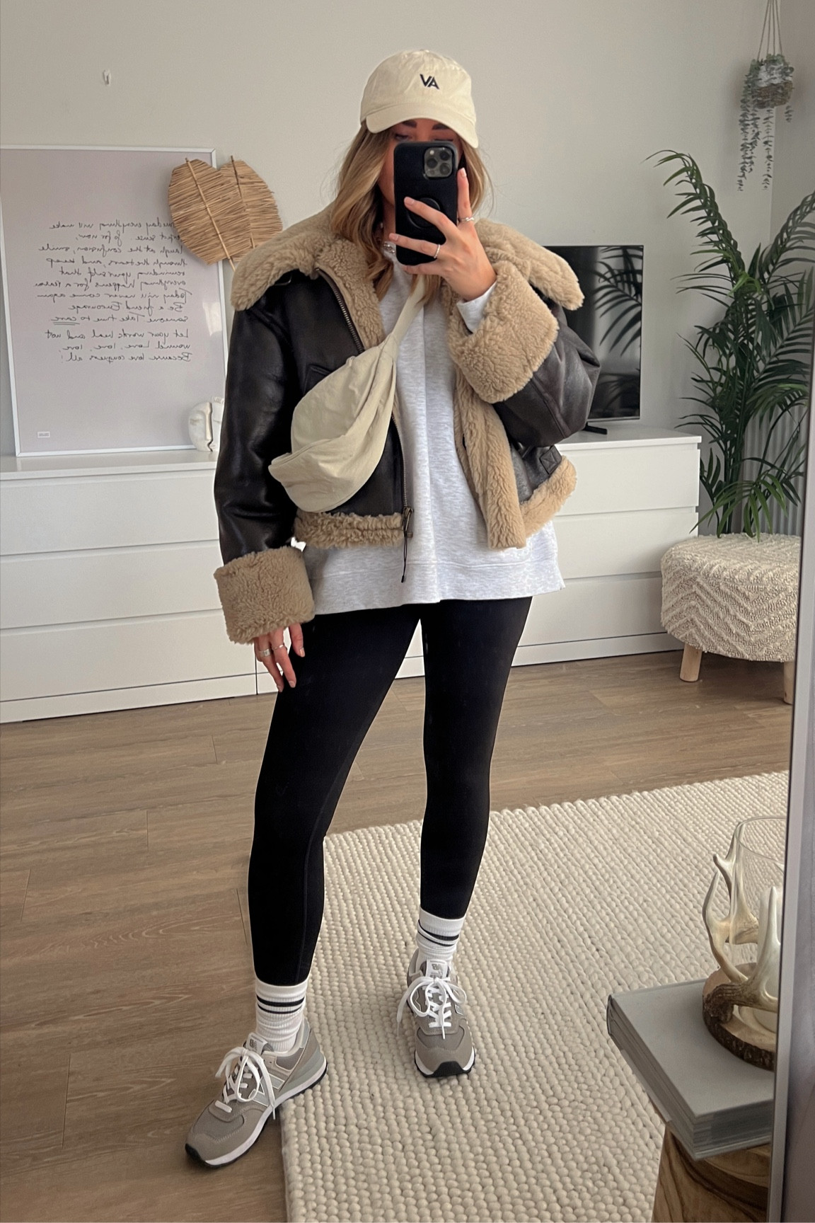 Winter outfit ideas. Styling the Zara aviator jacket with oversized grey sweatshirt and Uniqlo cream crossbody bag and H&M shaping leggings with new balance 574 trainers 

#LTKunder50 #LTKSeasonal