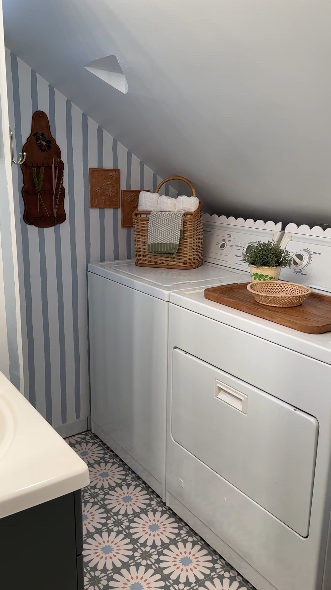 Scalloped wood trim two ways. I used it to add character to a bathroom cabinet and also to dress up an old washer and dryer. 

Fastened it to the cabinet with my Brad nailer, and to the laundry machines with Glue Dots.

DIY | home decor | home improvement | trim | scallops 

#LTKHome