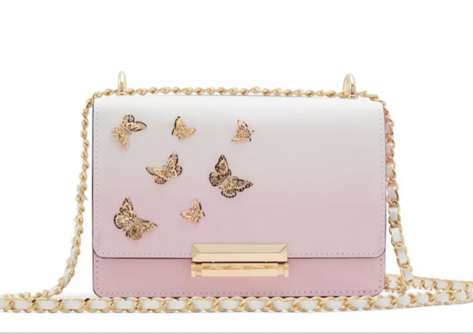 Beautiful butterfly purse that is definitely on theme if you are looking to add some #Barbiecore to your wardrobe 

#LTKitbag #LTKfit #LTKstyletip
