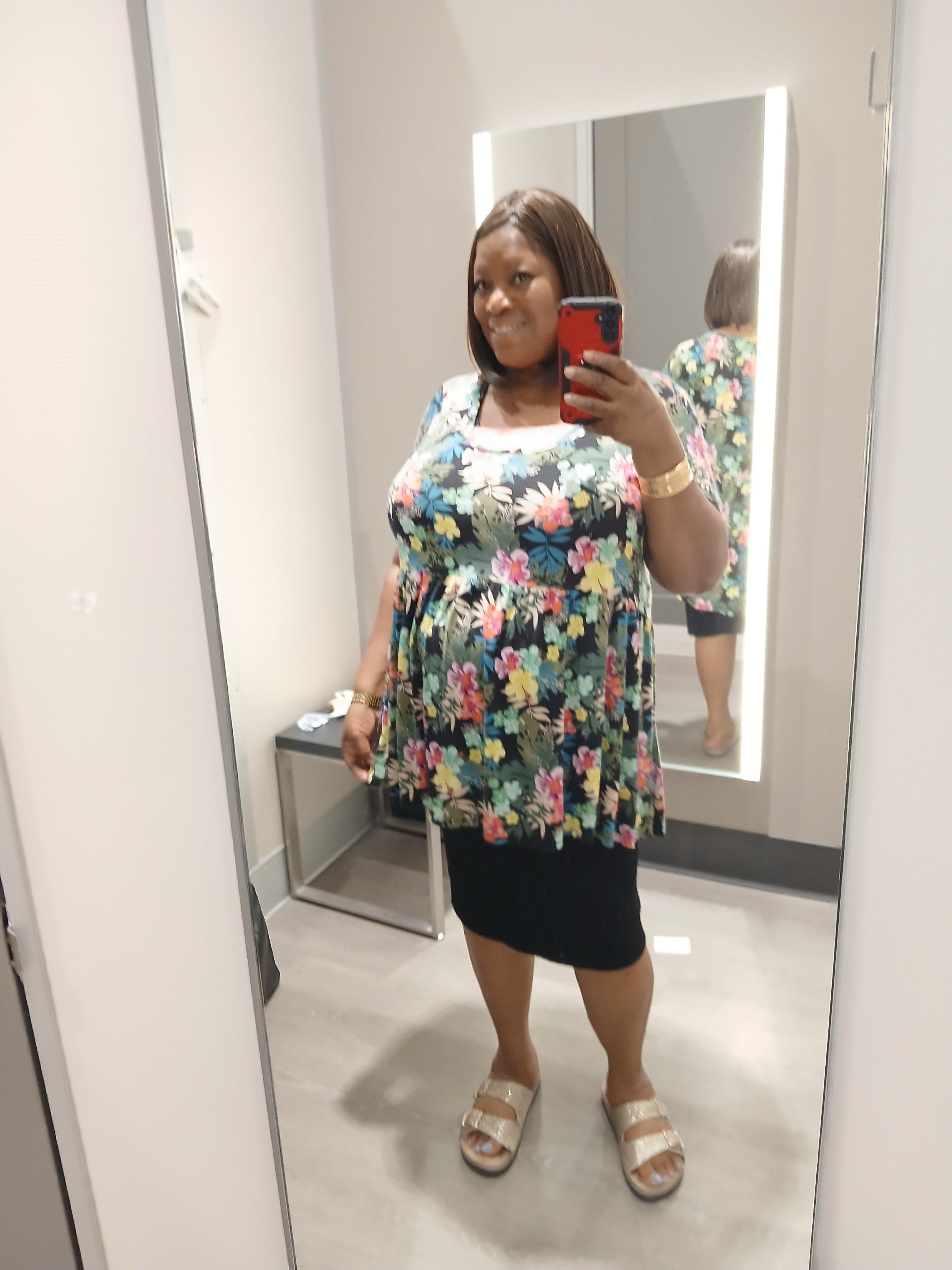 Plus size floral top with black skirt, gold sandals, and gold bangle bracelets. A casual outfit that is comfortable but you will still look pulled together. -#ad

#LTKootd #LTKOver40 #LTKPlusSize