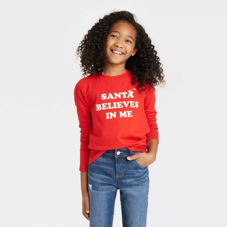 Girls' 'Santa Believes In Me' Long Sleeve Graphic T-Shirt - Cat & Jack™ Red | Target