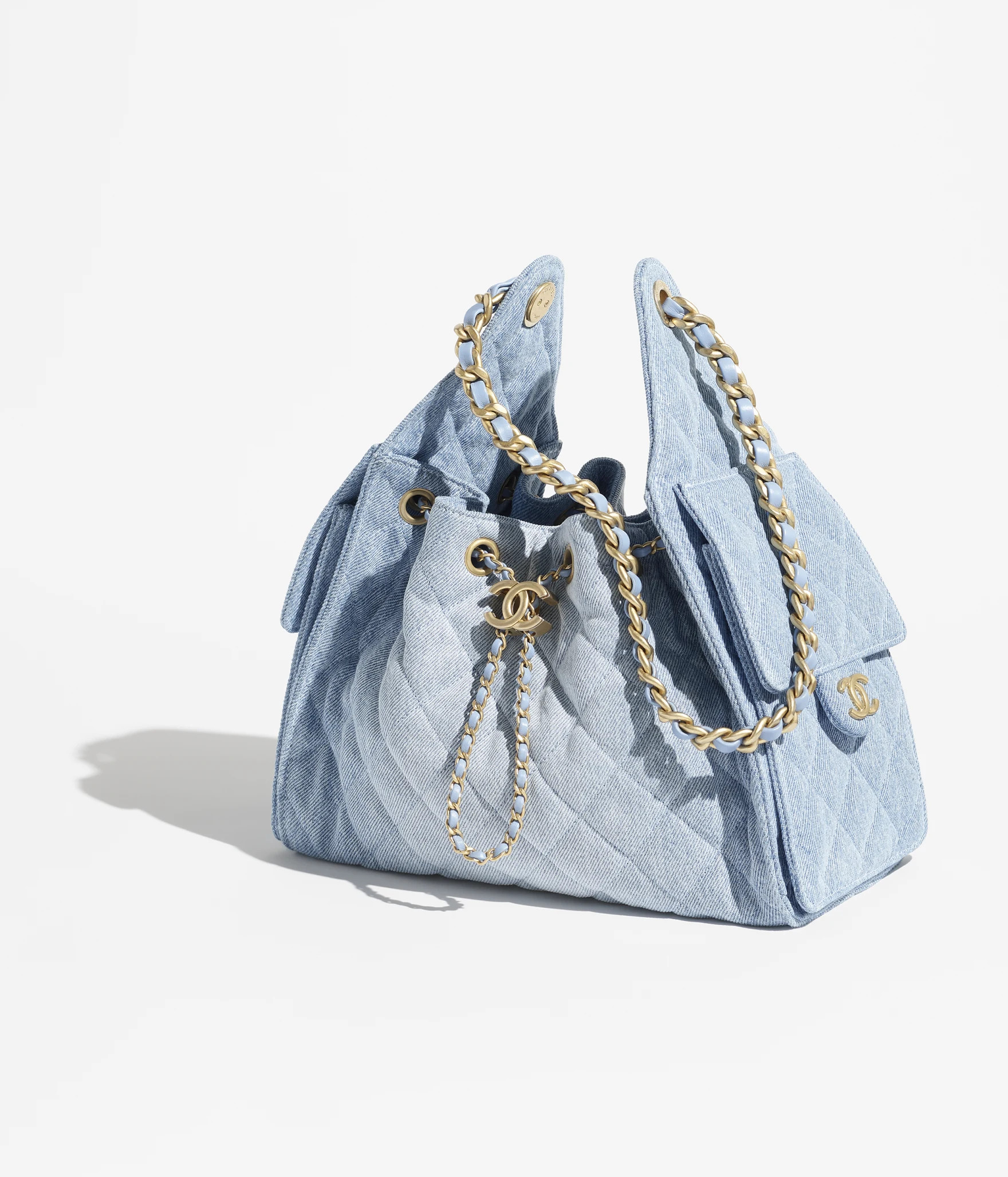 Chanel 25 small handbag, Washed denim & gold-tone metal, blue — Fashion | CHANEL | Chanel, Inc. (US)