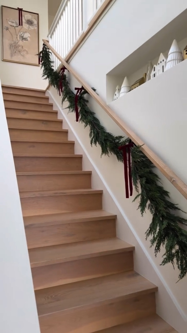 🎄 Garland staircase reveal 

How stunning is this garland from @crateandbarrel 

Shop this garland and other Black Friday deals on my LTK. Link in bio 🎄💫 
#garland #staircase #holiday #Christmas #mycb2 #christmasdecor #reveal #homedecor #homesweethome #homefortheholidays @shop.ltk @ltk.creators @ltk.home