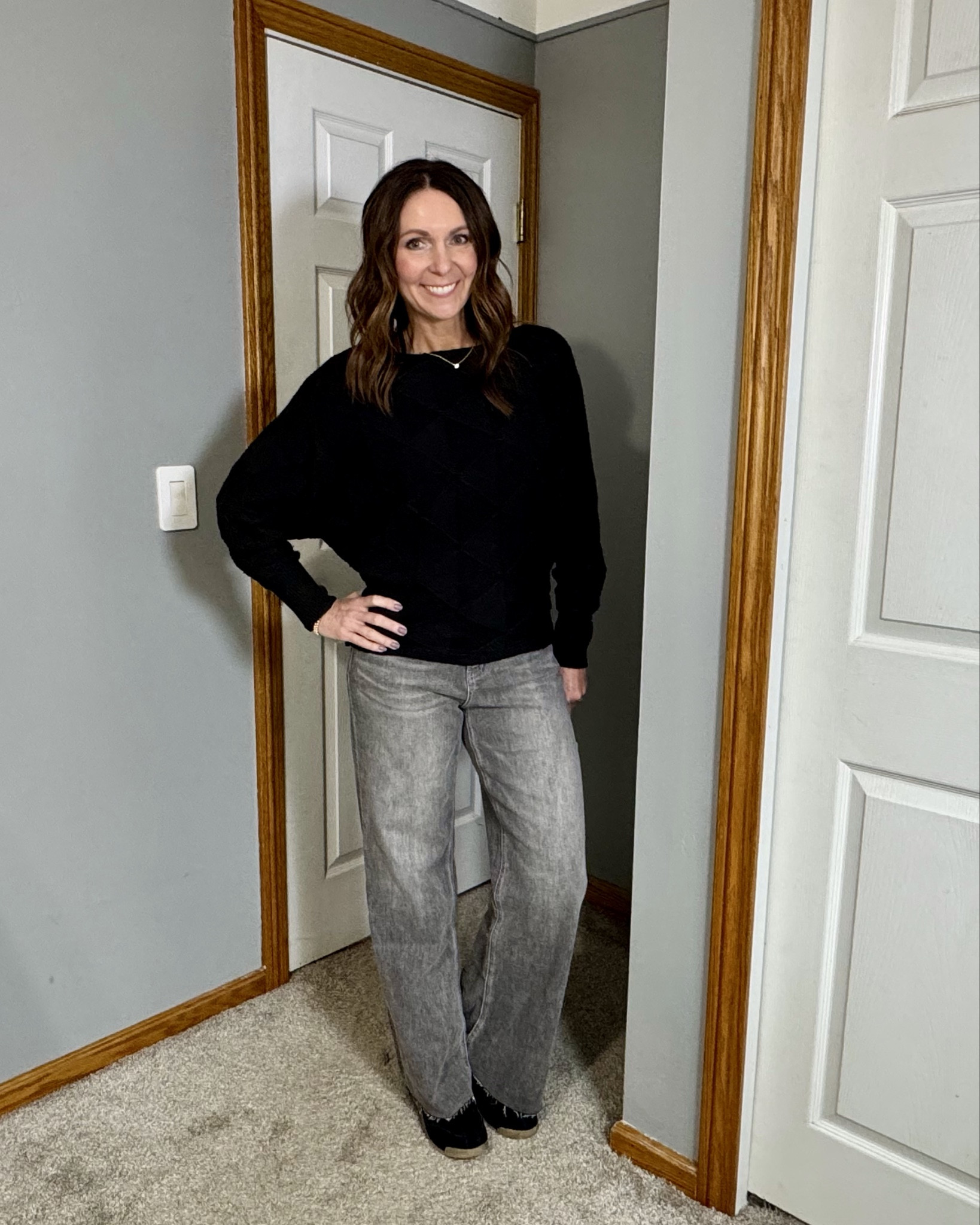 Easy teacher outfit that feels comfortable but still looks put together. This black sweater is one of those staples you can wear on repeat and these wide leg jeans give the perfect relaxed but polished look for a full day in the classroom. Finished it off with my go to black sneakers that keep me comfortable all day. Everything linked here. 🖤 #teacherstyle
#teacheroutfit
#teacherootd
#casualteacherstyle
#classroomstyle
#teacherfashion
#everydayoutfit
#widelegjeans

#LTKWorkwear #LTKootd #LTKOver40