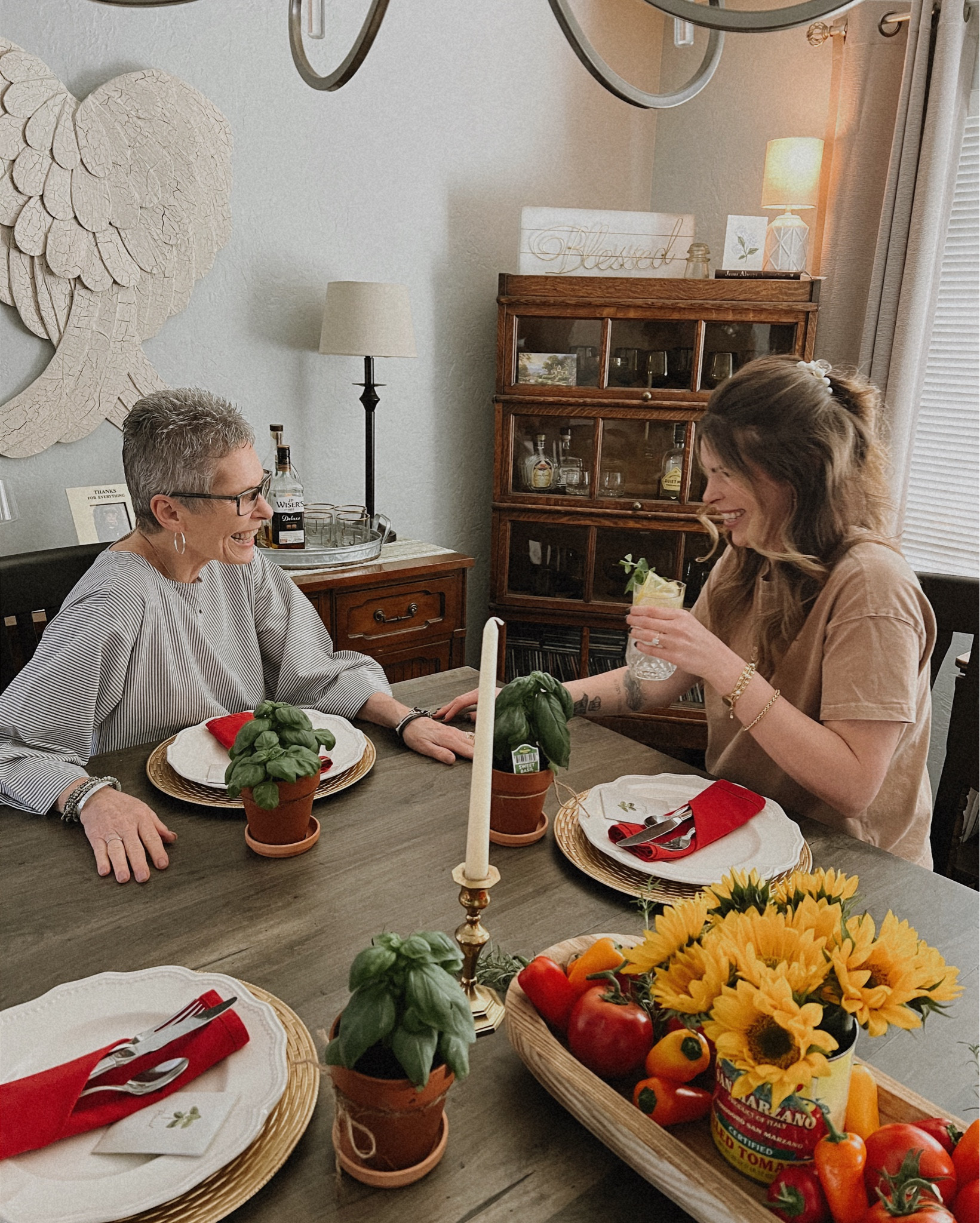 An Italian Countryside Themed Girl’s Night! I wanted to create a tablescape that made you feel like you were at an Italian Grandmas dining table in the country. We had fresh sunflowers, tomatoes, and peppers. Then we filled the table with homemade Italian appetizers. Each guest was given a basil plant in a terra cotta pot with a bag of basil seeds 🌱 We then had a Lemoncello Spritzer drink made with Lemoncello, Prosecco, and club soda. Topped with fresh lemons and mint  

#LTKhome #LTKparties
