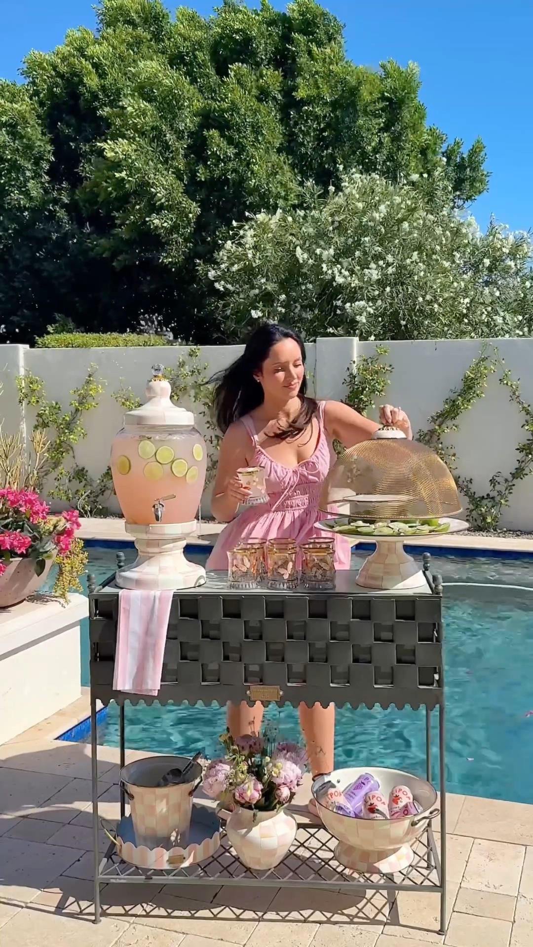 Pink has officially spilled into the backyard 💗 sorry, not sorry honey! Margaritas in butterfly cups just hit different 🦋✨ tags: Mackenzie Childs rosy check, outdoor drink / bar cart setup

#LTKfoodie #LTKHome