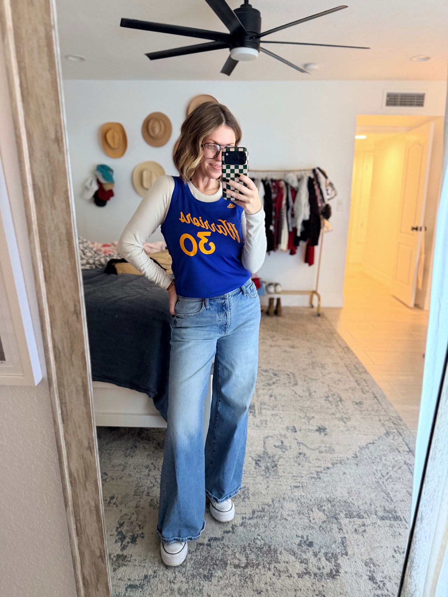 NBA Game Day
Warriors vs. Suns
.
Jeans: size 27 petite, fit is comfy, almost could size down, but might be too tight.
Jersey: linked similar. I’m wearing a women’s small and I have it tucked in. I also wear youth M-L in jerseys. 
Shoes: tts
Undershirt: my favorite layering piece. I have 4 colors and wear them all winter long. Lightweight and tight enough that they don’t feel bulky when layering, yet help keep you warm  

#LTKPetite #LTKOver40 #LTKootd