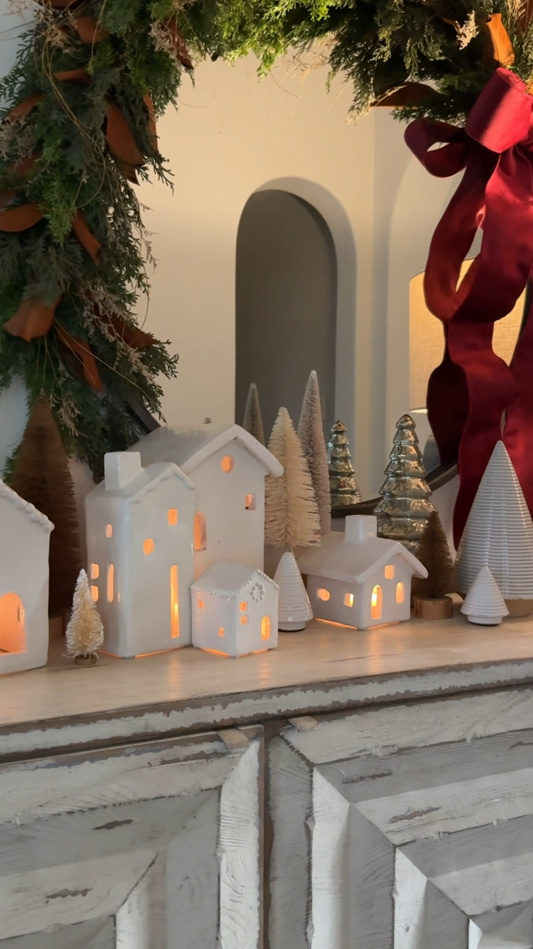 This white ceramic Christmas village is a favorite of mine year after year! The size and handmade nature will make them your favorite as well 🤍

If you’re fast you can pick up a few of them on sale today!!

The trees have been collected over the years from places like Homegoods. The garland is old, but I’m linking to similar. Dried grasses from the yard and magnolia leaves were added for interest.





#LTKHome #LTKSaleAlert #LTKHoliday