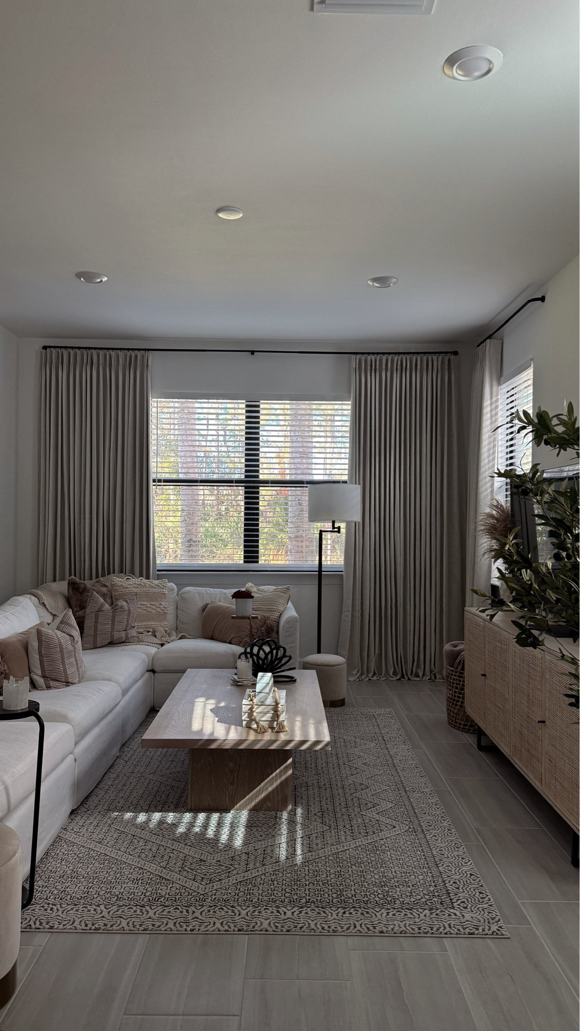 my Naples Living Room - these Amazon curtains are so good! Details: Pinch pleat Amazon curtain - the large window has 2 60x108 panels on it, we hung them 4 inches from the ceiling using the curtain rod linked below & 1 inch rings. 

Home decor, modern home, neutral decor, home accents, Amazon home, Amazon sale   

#LTKHome #LTKStyleTip #LTKSaleAlert