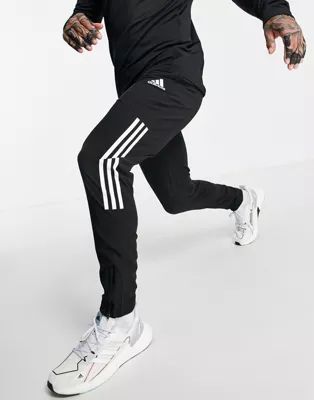 adidas Training sweatpants with three stripe in black | ASOS (Global)