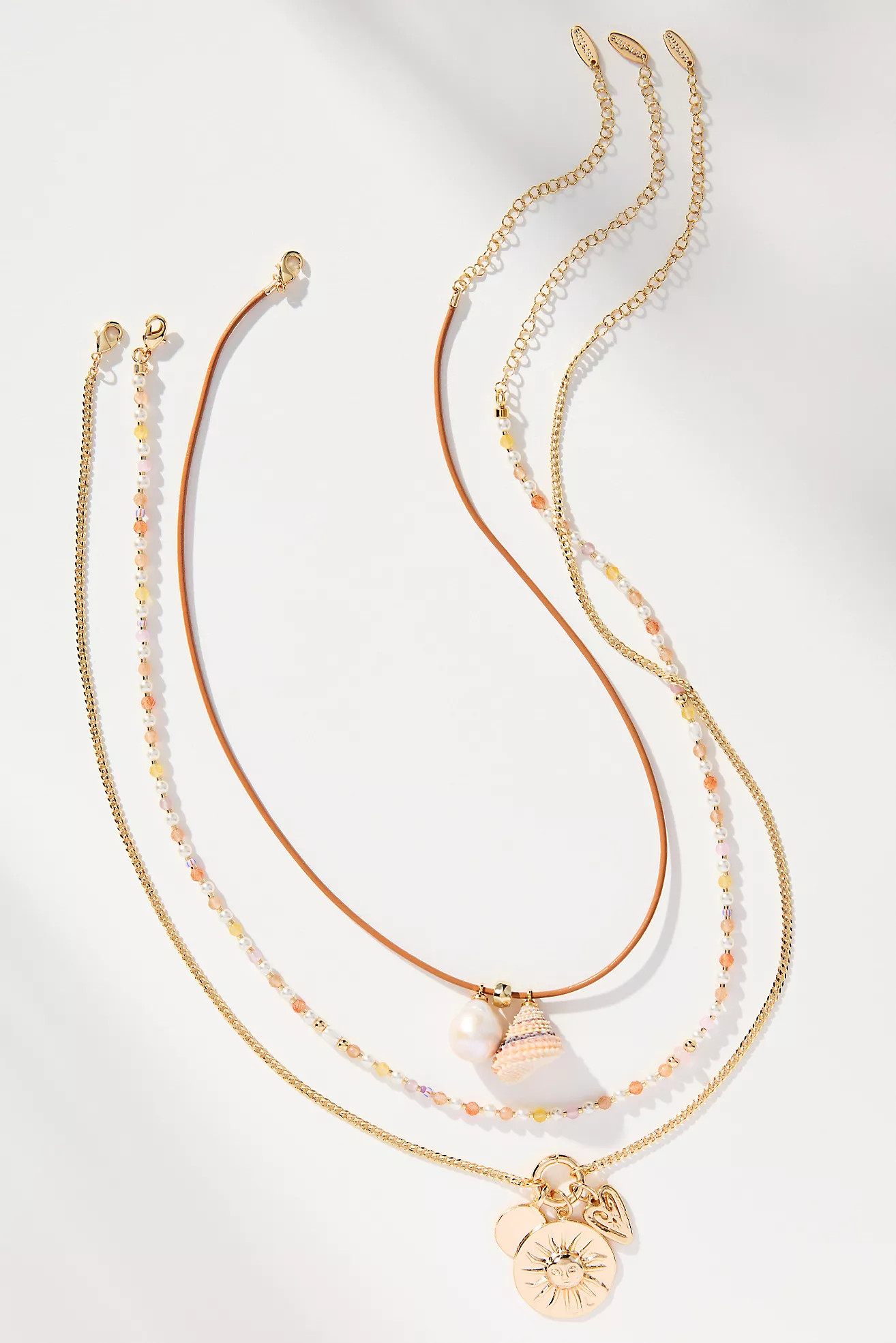 Shades of Sea Layered Necklaces: Charm Edition | Anthropologie (US)