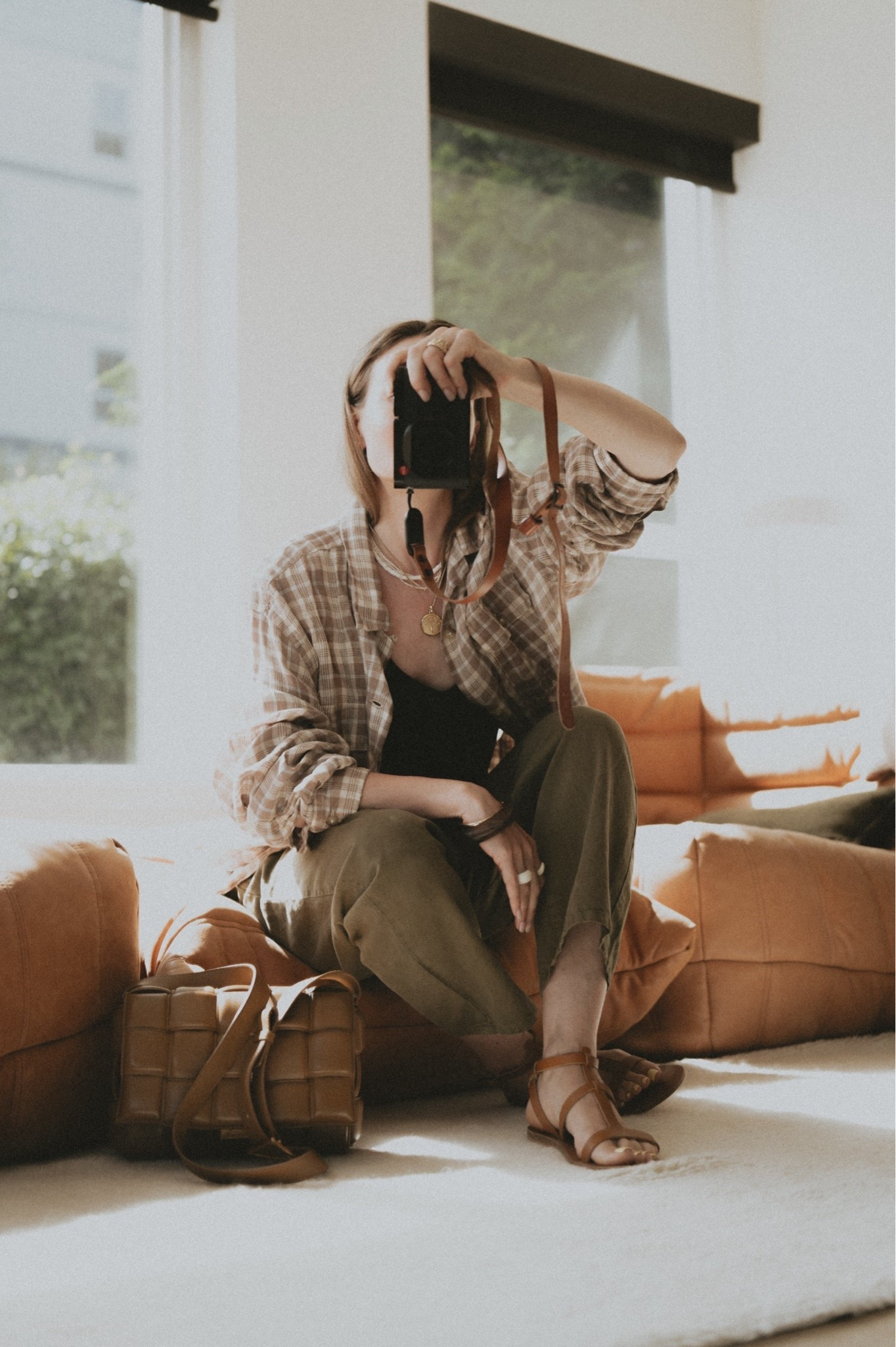 Outfit idea: silk cami + linen flannel shirt + barrel leg pants + gladiator sandals + woven leather bag + statement jewelry. 
Bag: Bottega Veneta Padded Casette 
Pants: Nili Lotan Shon
Jewelry: @Etsy & David Yurman
Sandals: K. Jacques St. Tropez

#LTKootd #LTKSeasonal #LTKWorkwear