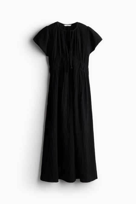 Ruffle sleeve black midi dress 

#LTKSeasonal #LTKfindsunder50 #LTKstyletip