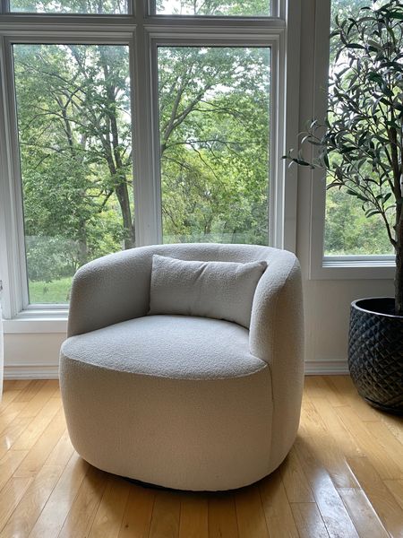 The perfect boucle accent chair! Smooth swivel, comes with a lumbar throw pillow, 5 color options and fully assembled. It adds so much to my home and pairs well with any style! 

#LTKhome