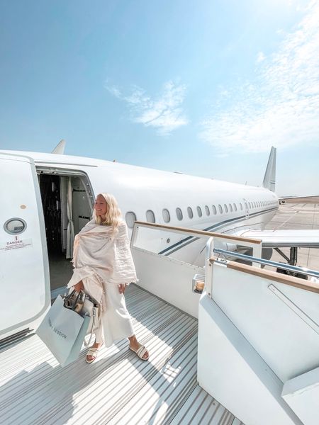 Pinch me moment about to board a private jet 🛩️ 
Wearing the best travel scarf for the Middle East 🕌

#LTKtravel #LTKSeasonal #LTKstyletip